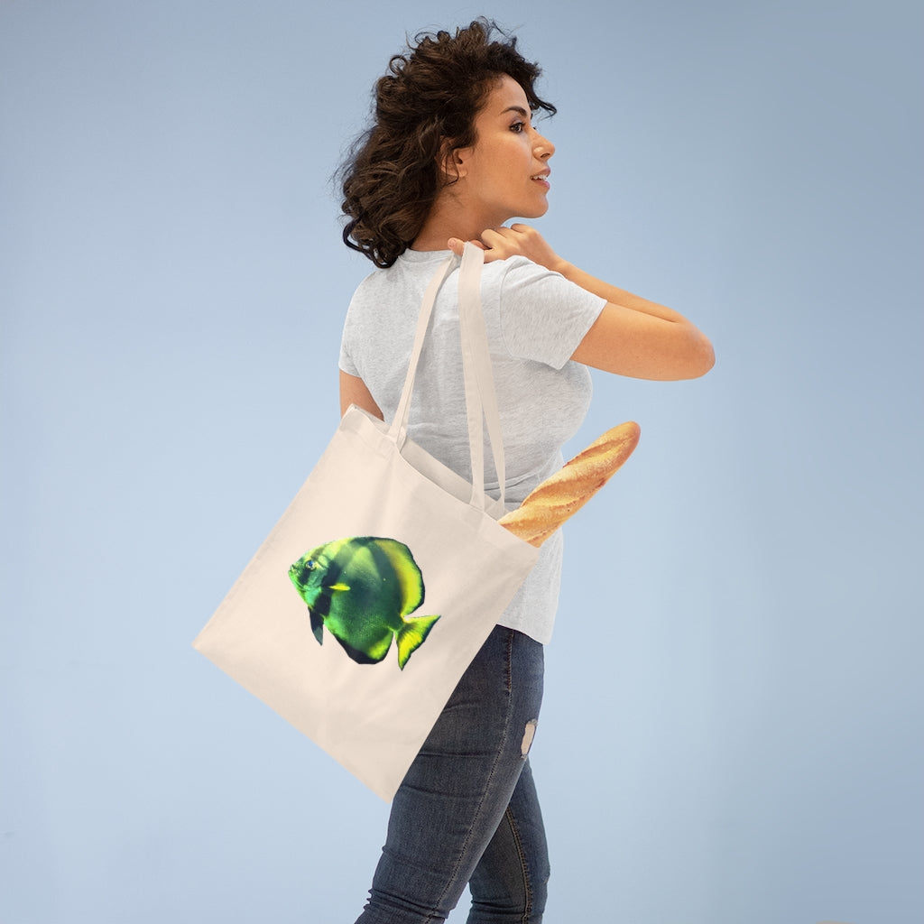 A vibrant Green Fish Tote Bag made of 100% cotton with long handles and cross stitching for added stability.