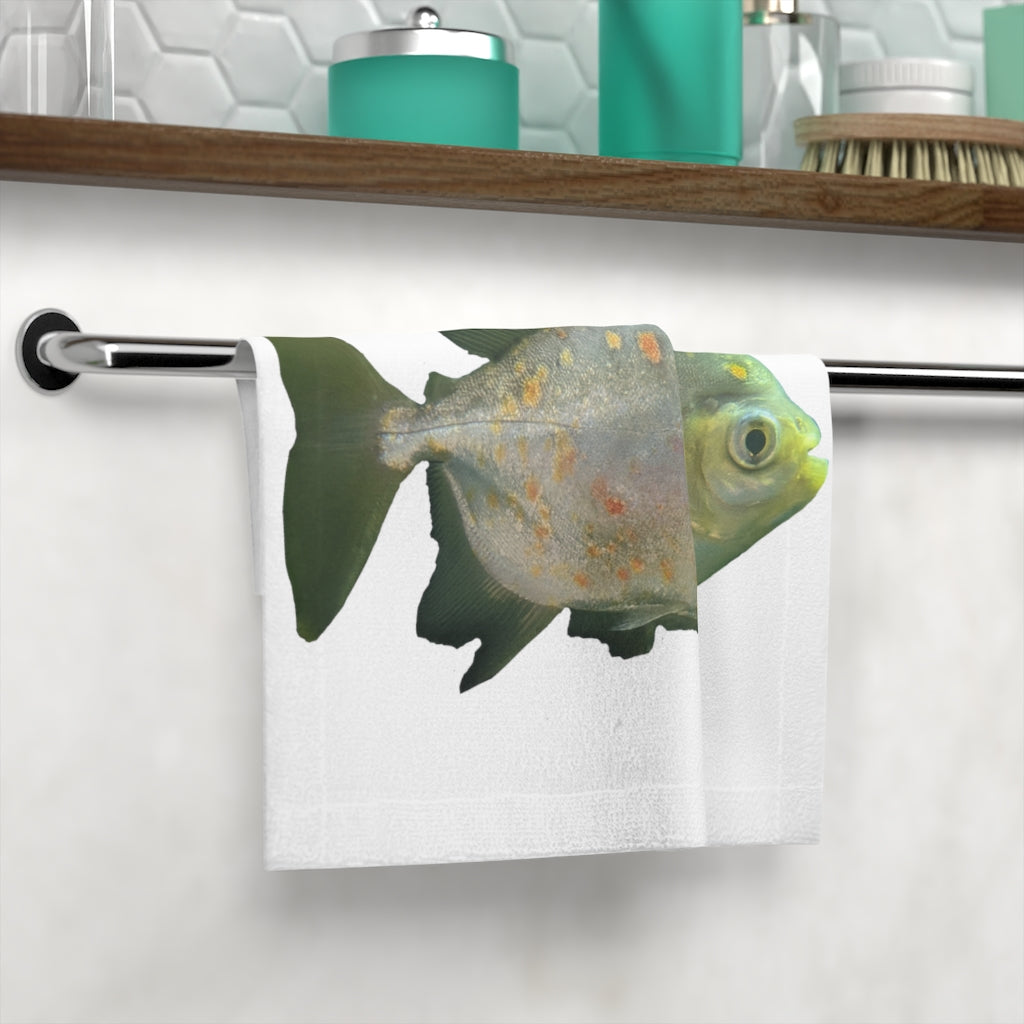 A vibrant green face towel featuring a whimsical fish with glasses, made from a soft polyester blend front and absorbent cotton back.