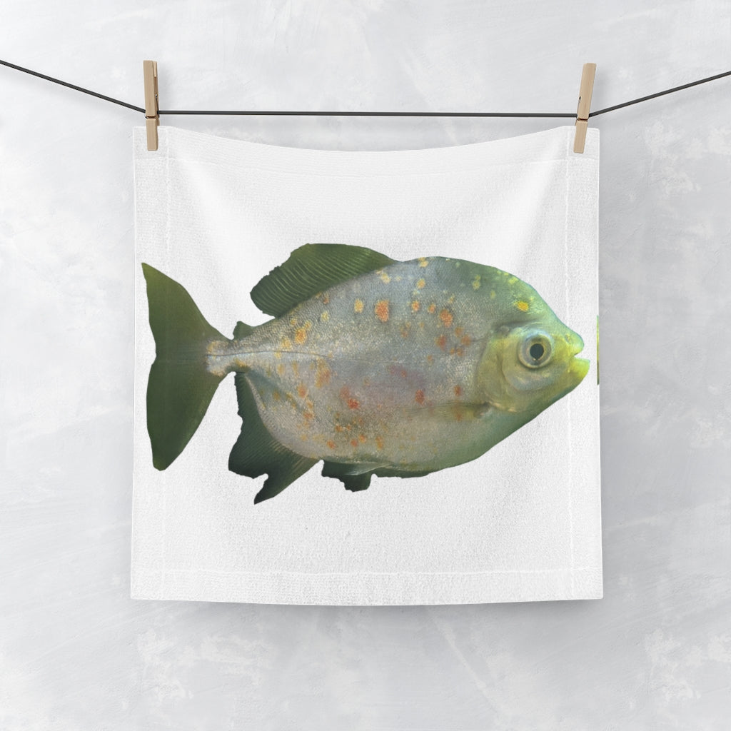 A vibrant green face towel featuring a whimsical fish with glasses design, made from a soft polyester blend and absorbent cotton.