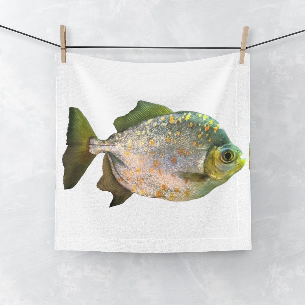 A vibrant green face towel featuring a whimsical fish with glasses design, made from a soft polyester blend front and absorbent cotton back.