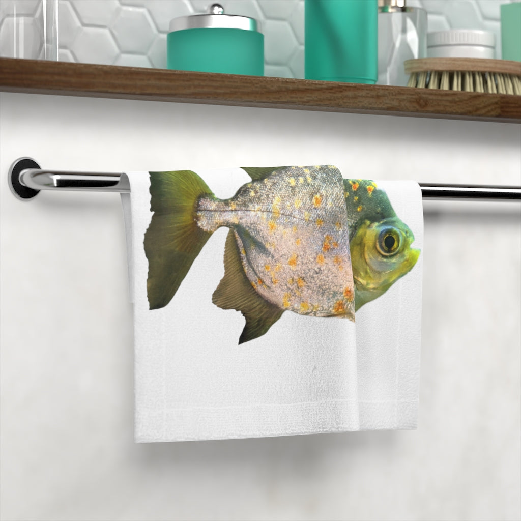 A vibrant green face towel featuring a whimsical fish with glasses design, made from a soft polyester blend front and absorbent cotton back.