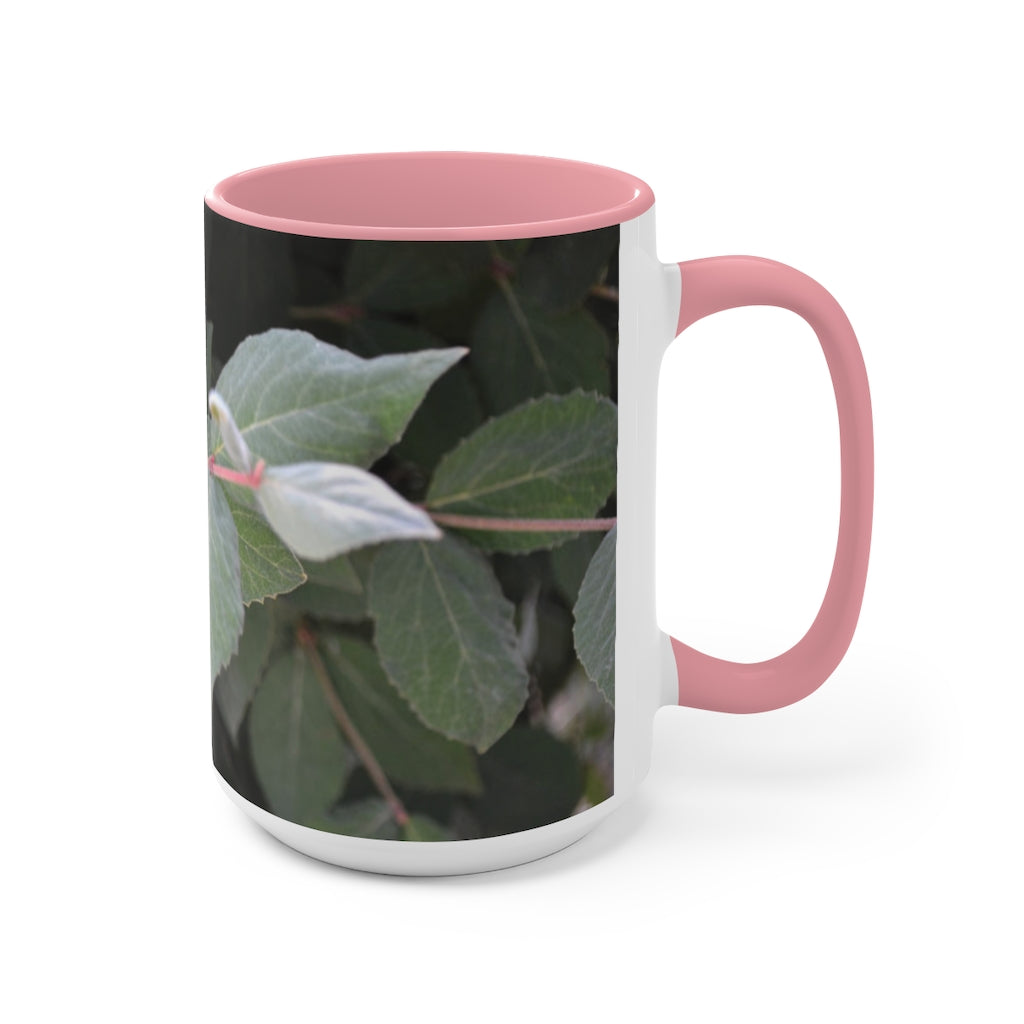 A stylish Green Leaves Accent Mug featuring a white exterior with a colored interior, showcasing a beautiful green leaves design.