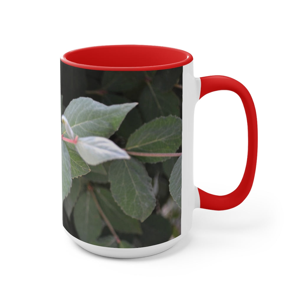 A stylish Green Leaves Accent Mug featuring a white exterior with a colored interior, showcasing a beautiful green leaves design.