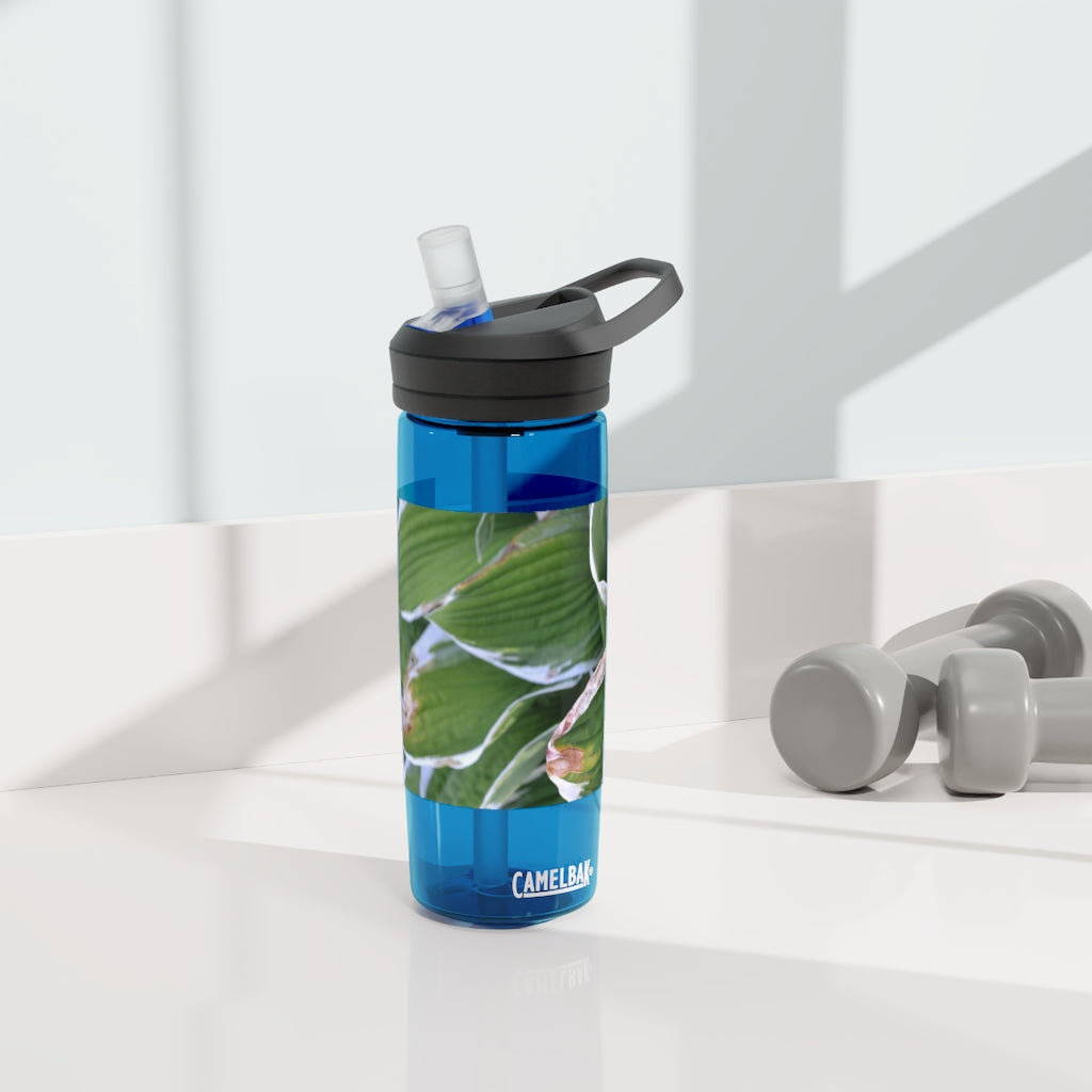 Green Leaves CamelBak Eddy® Water Bottle in 20oz and 25oz sizes, showcasing its durable design and spill-proof valve.