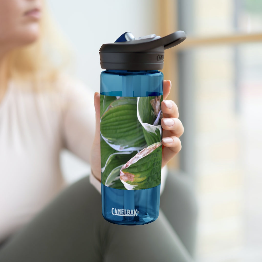 Green Leaves CamelBak Eddy® Water Bottle in 20oz and 25oz sizes, showcasing its durable design and spill-proof valve.