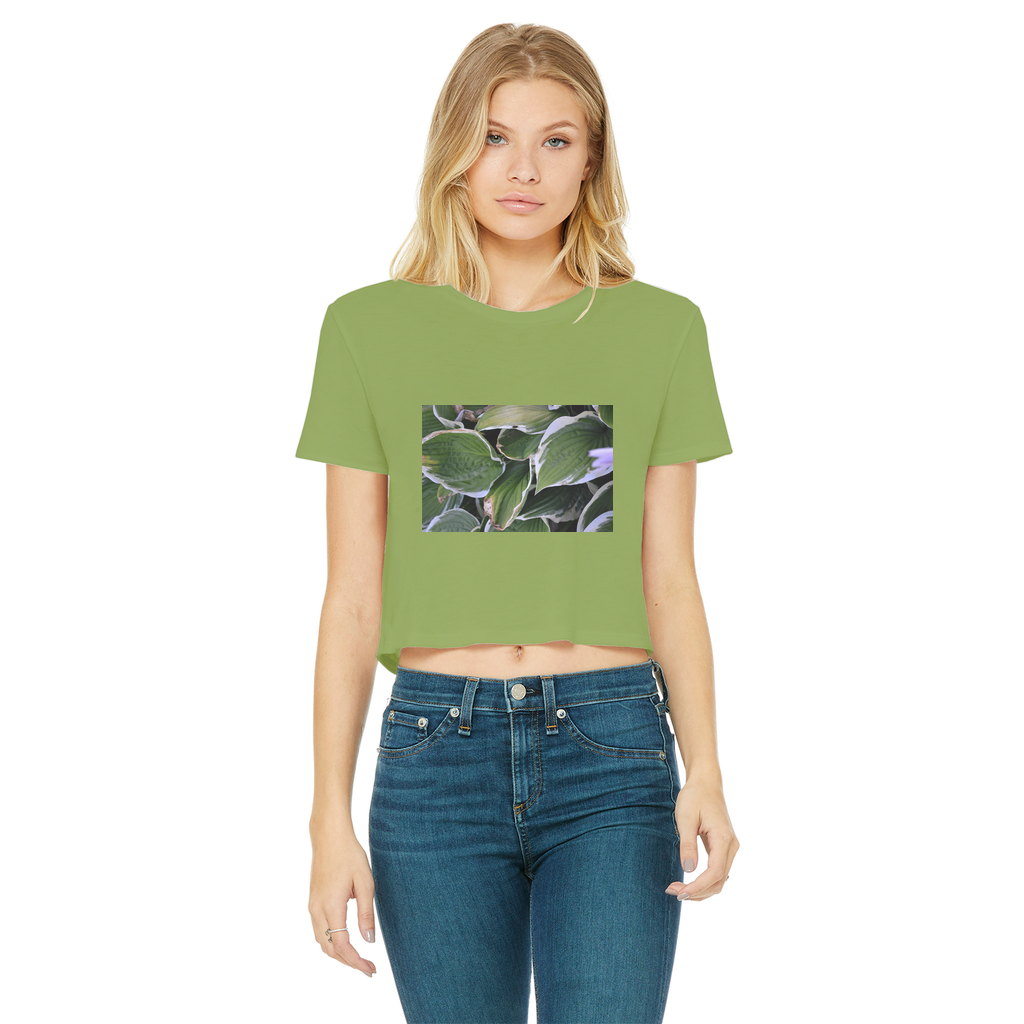 Green Leaves Classic Women's Cropped Raw Edge T-Shirt featuring a round neck, short sleeves, and a stylish raw edge cut hem.