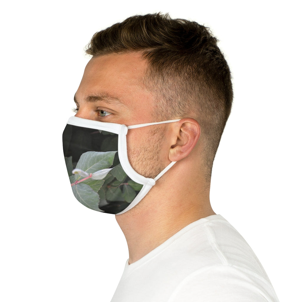 Green Leaves Cotton Face Mask featuring a stylish leaf pattern, made from 100% cotton with adjustable earloops and nose wire.