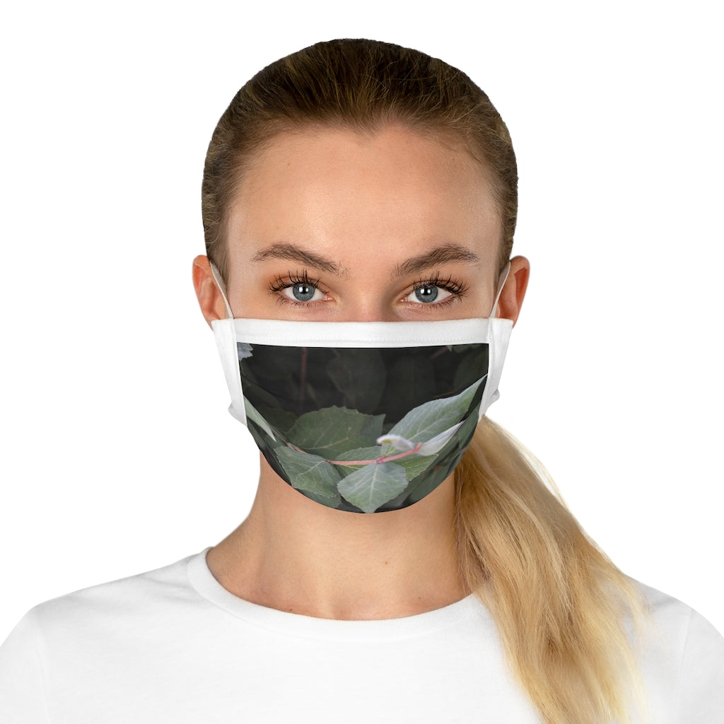 Green Leaves Cotton Face Mask featuring a stylish leaf pattern, made from 100% cotton with adjustable earloops and nose wire.