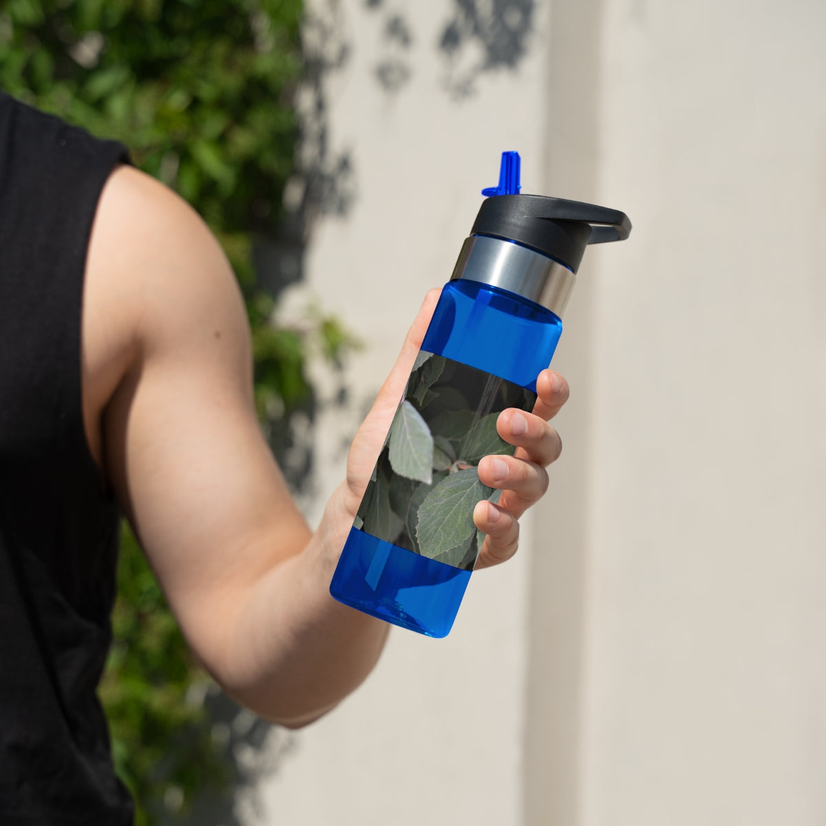 Green Leaves Kensington Tritan™ Sport Bottle in vibrant green color, featuring a screw-on lid, straw, and carabiner hook for easy attachment.