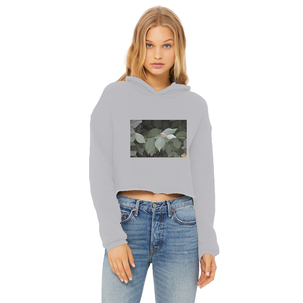 Green Leaves Ladies Cropped Raw Edge Hoodie featuring a stylish cropped design, raw edge hem, and soft cotton fabric.