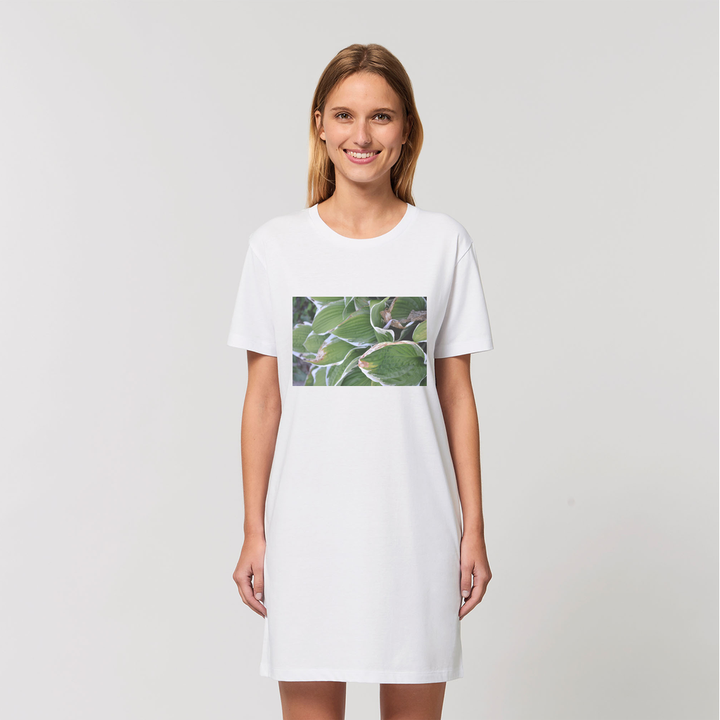 A stylish Green Leaves Organic T-Shirt Dress made from 100% organic cotton, showcasing its soft texture and casual design.