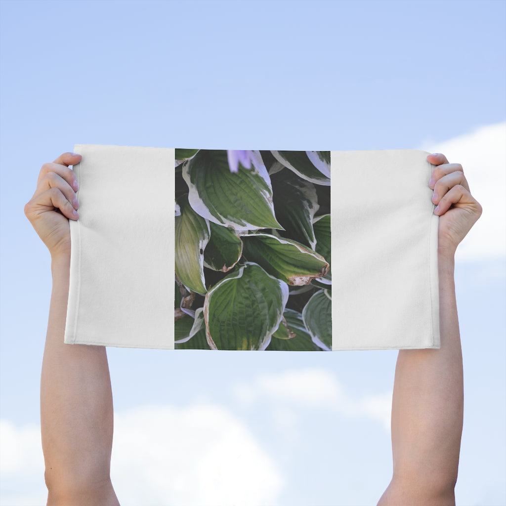 Green Leaves Rally Towel measuring 11x18 inches, featuring a soft cotton backing and printed mink polyester front.