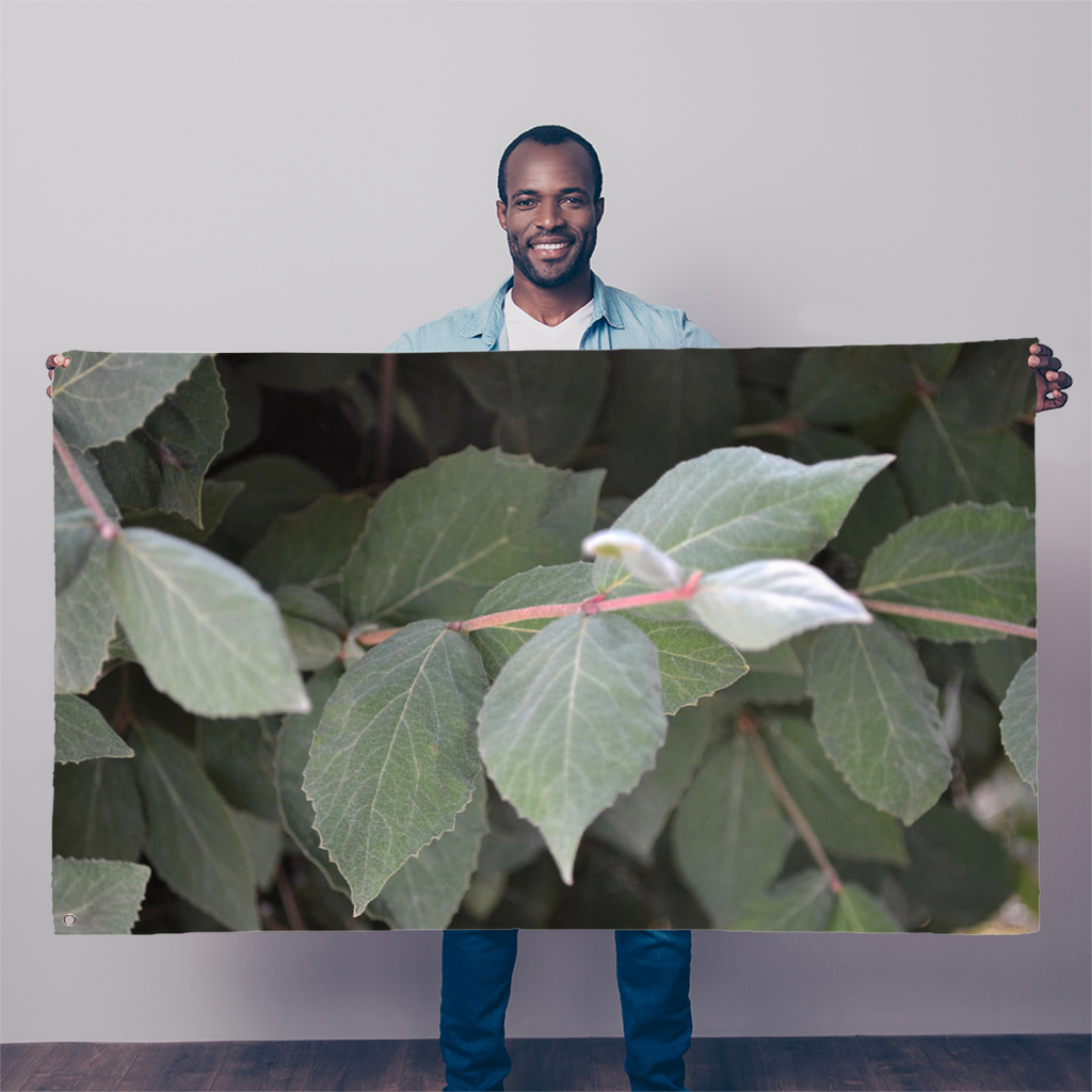 Green Leaves Sublimation Flag, 5FT x 3FT, made of durable polyester fabric with double-stitched edges and eyelets for hanging.