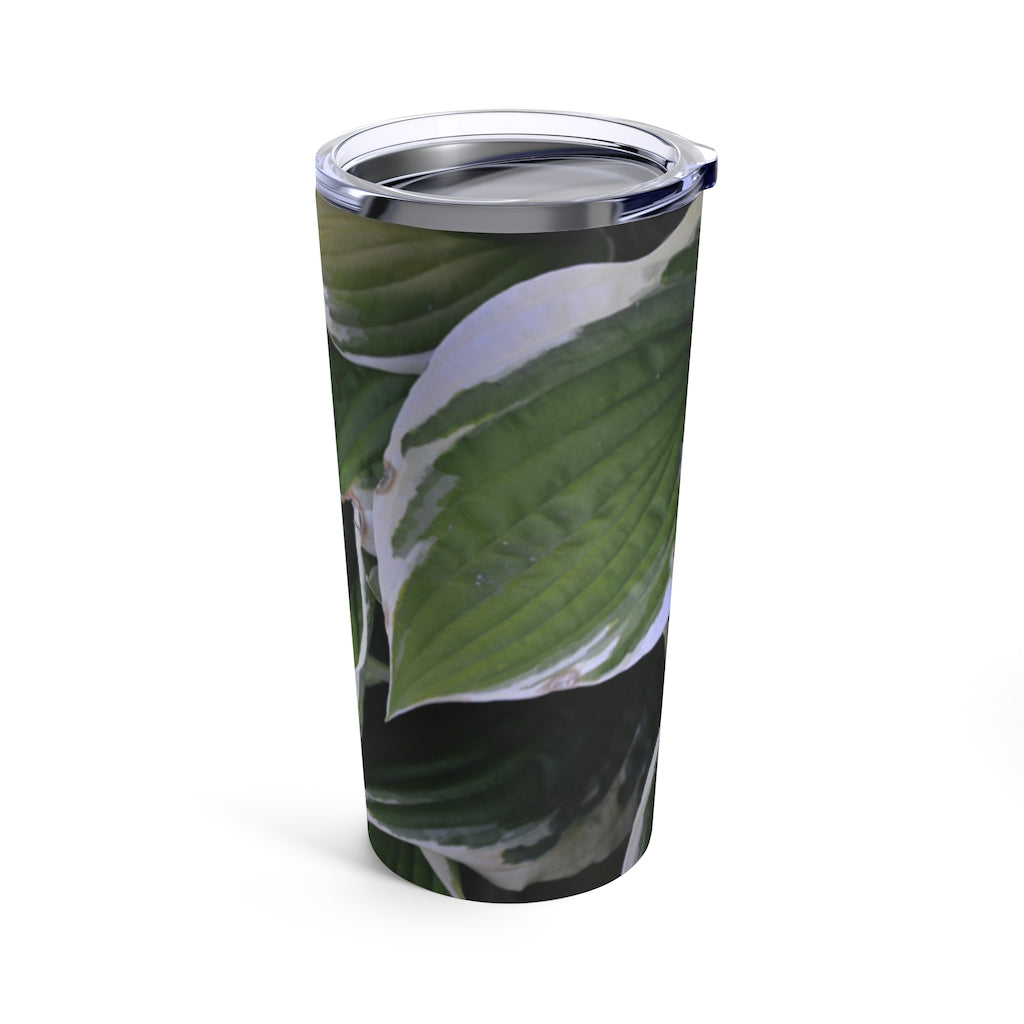 Green Leaves Tumbler 20oz made of stainless steel with a see-thru plastic lid, featuring a stylish green leaves design.