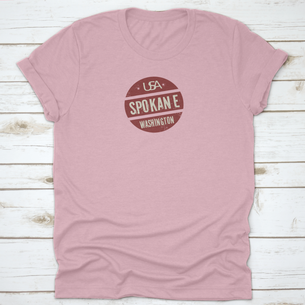 Grunge vintage round stamp design featuring Spokane, Washington, on a comfortable cotton t-shirt.