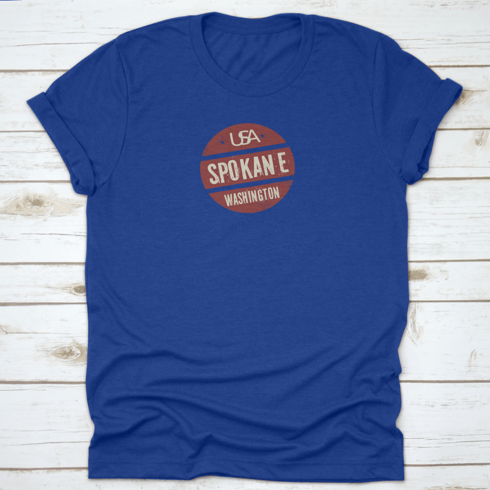 Grunge vintage round stamp design featuring Spokane, Washington, on a comfortable cotton t-shirt.