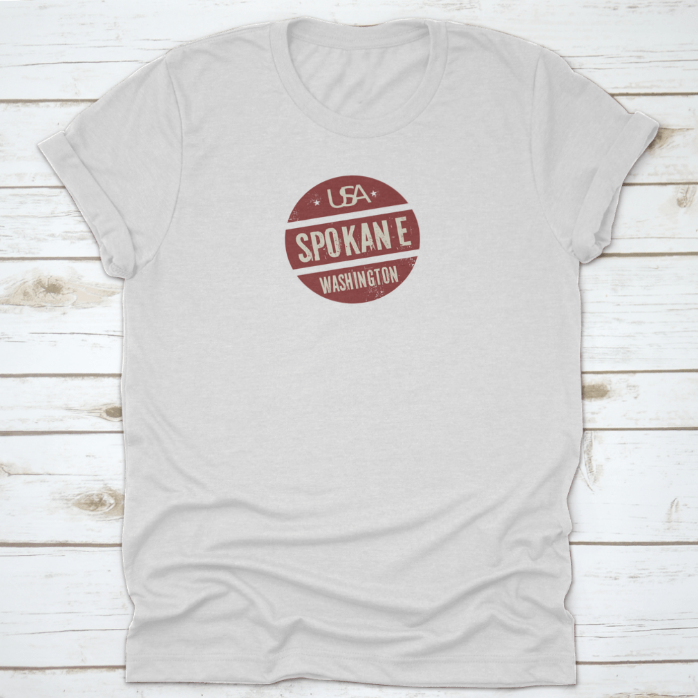 Grunge vintage round stamp design featuring Spokane, Washington, on a comfortable cotton t-shirt.