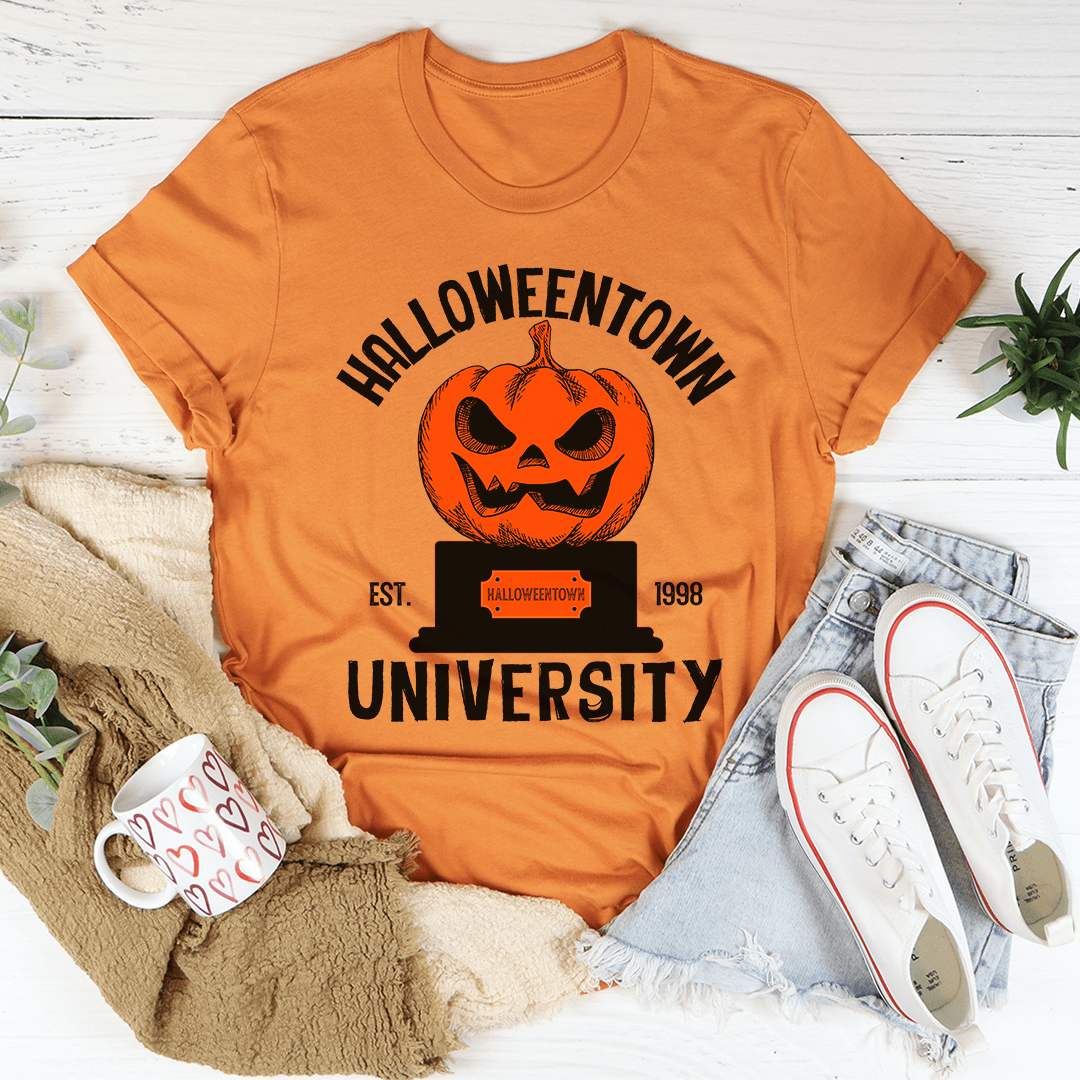 A cozy Halloween University T-Shirt made of soft ring-spun cotton, featuring double stitching for durability, perfect for Halloween celebrations.