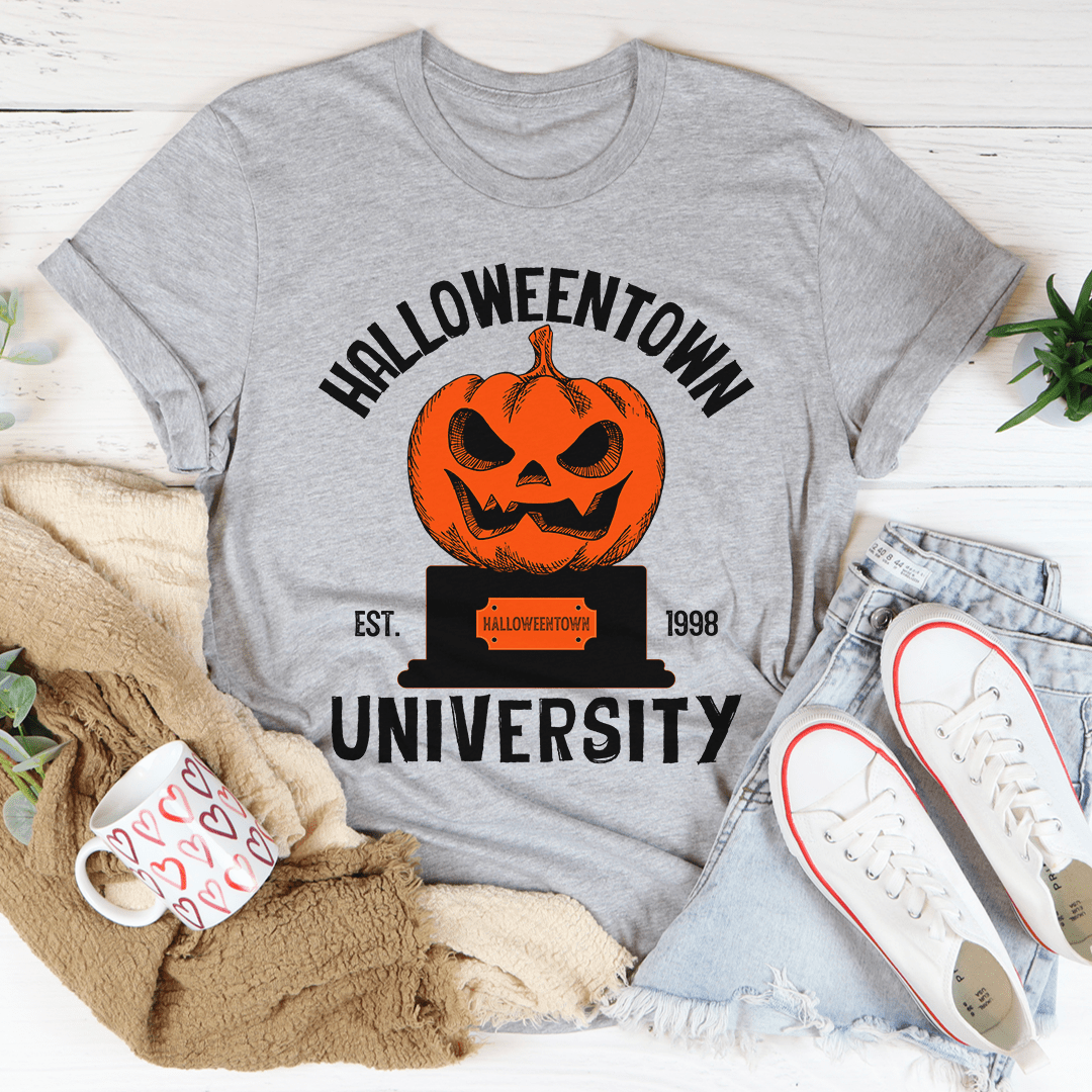 A cozy Halloween University T-Shirt made of soft ring-spun cotton, featuring double stitching for durability, perfect for Halloween celebrations.