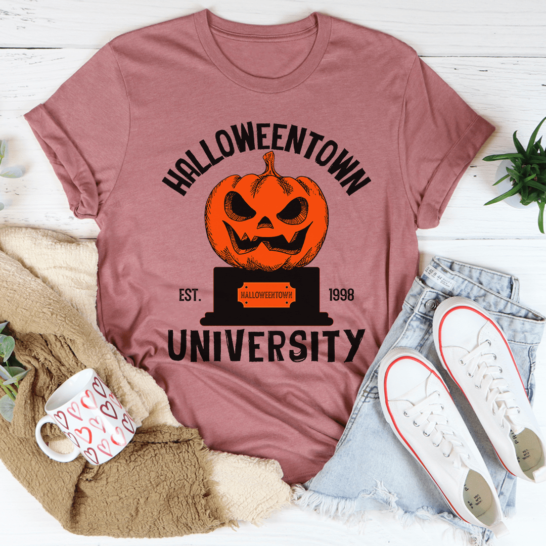 A cozy Halloween University T-Shirt made of soft ring-spun cotton, featuring double stitching for durability, perfect for Halloween celebrations.