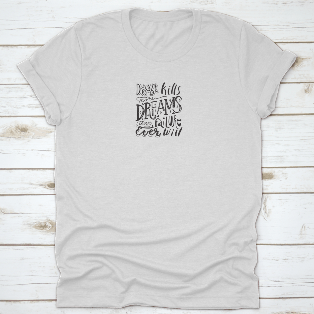 Hand painted T-shirt featuring the quote 'Doubt Kills More Dreams Than Failure' on a soft cotton fabric.