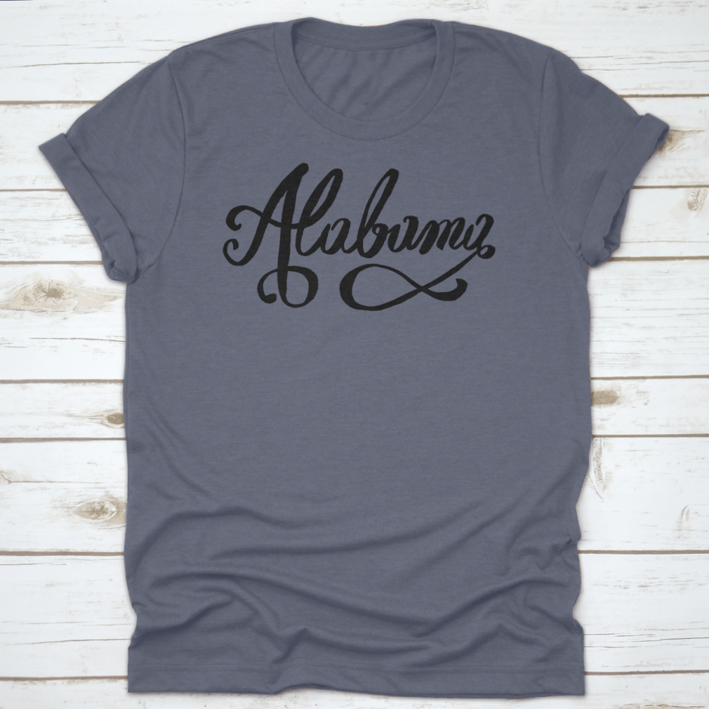 Hand-Lettering Calligraphy design of Alabama featuring an infinity sign, showcasing artistic typography on a soft fabric.