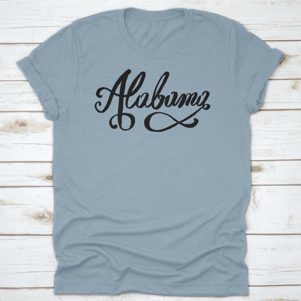 Hand-Lettering Calligraphy design of Alabama featuring an infinity sign, showcasing artistic typography on a soft fabric.