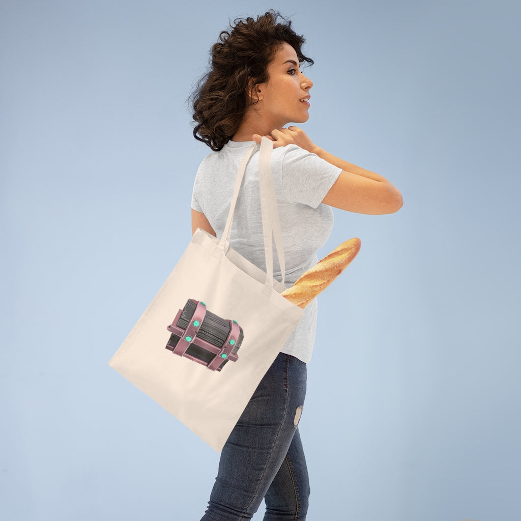 A colorful hand-painted chest tote bag made of 100% cotton with long handles and cross stitching for added stability.