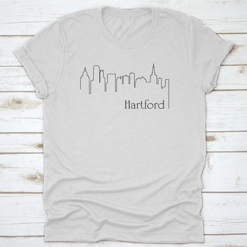 A stylish t-shirt featuring a one line drawing abstract background with a cityscape design, made from high-quality cotton.