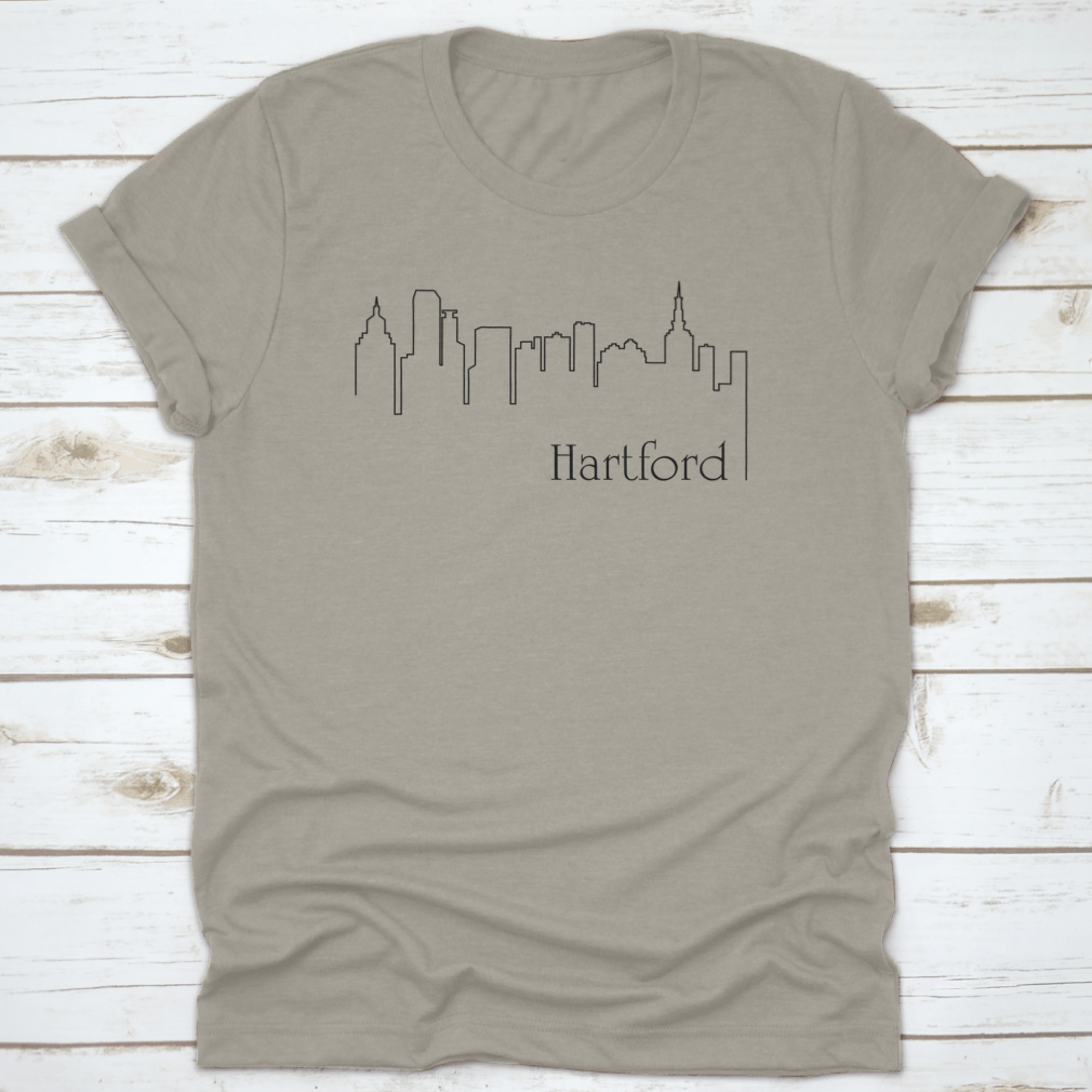 A stylish t-shirt featuring a one line drawing abstract background with a cityscape design, made from high-quality cotton.