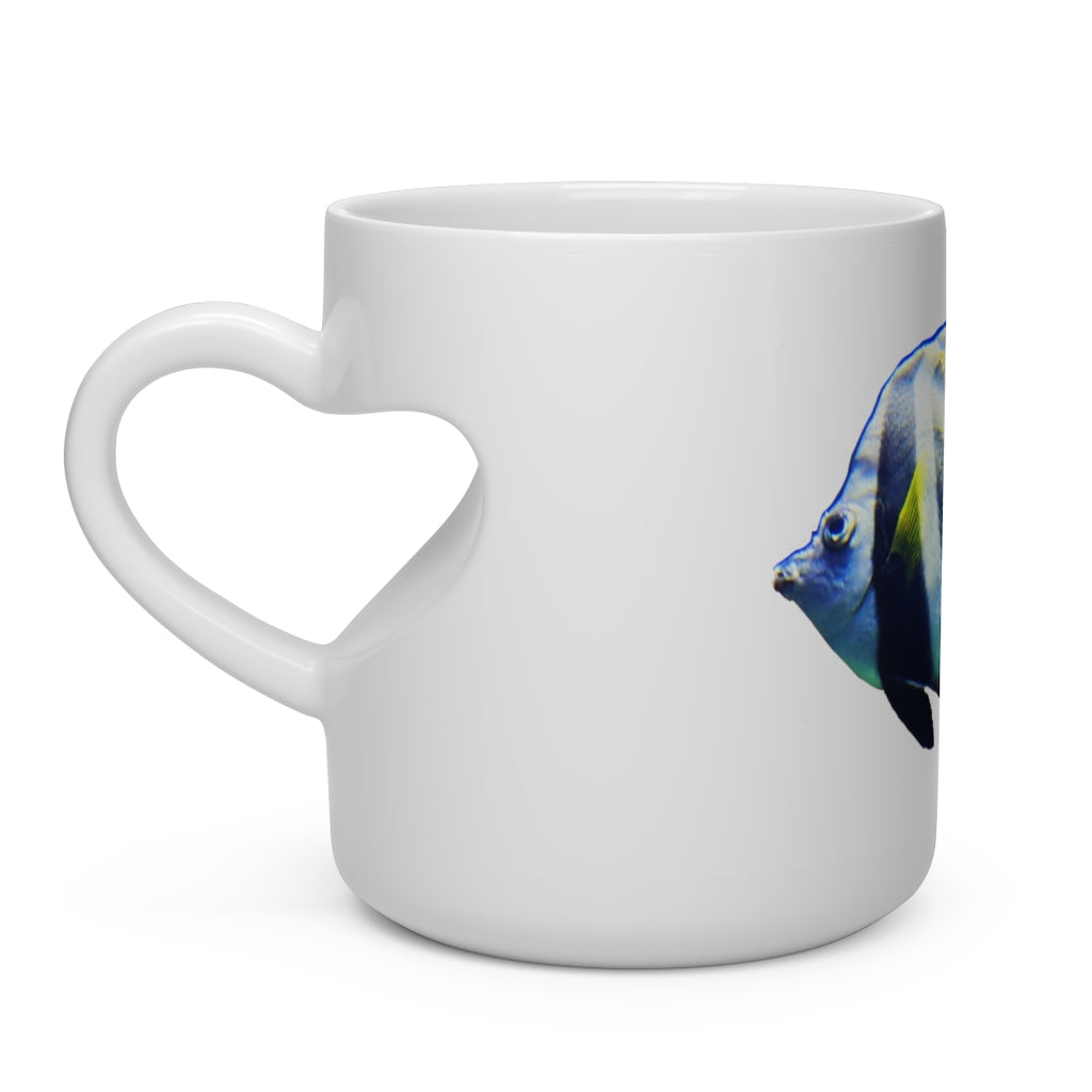 A white ceramic heart-shaped mug with a heart-shaped handle, perfect for hot beverages.