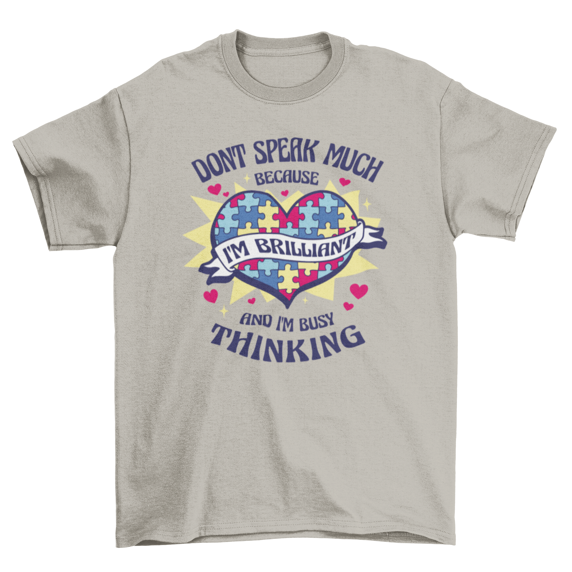 A stylish t-shirt featuring a heart made of colorful puzzle pieces with an inspiring quote about brilliance and thinking.