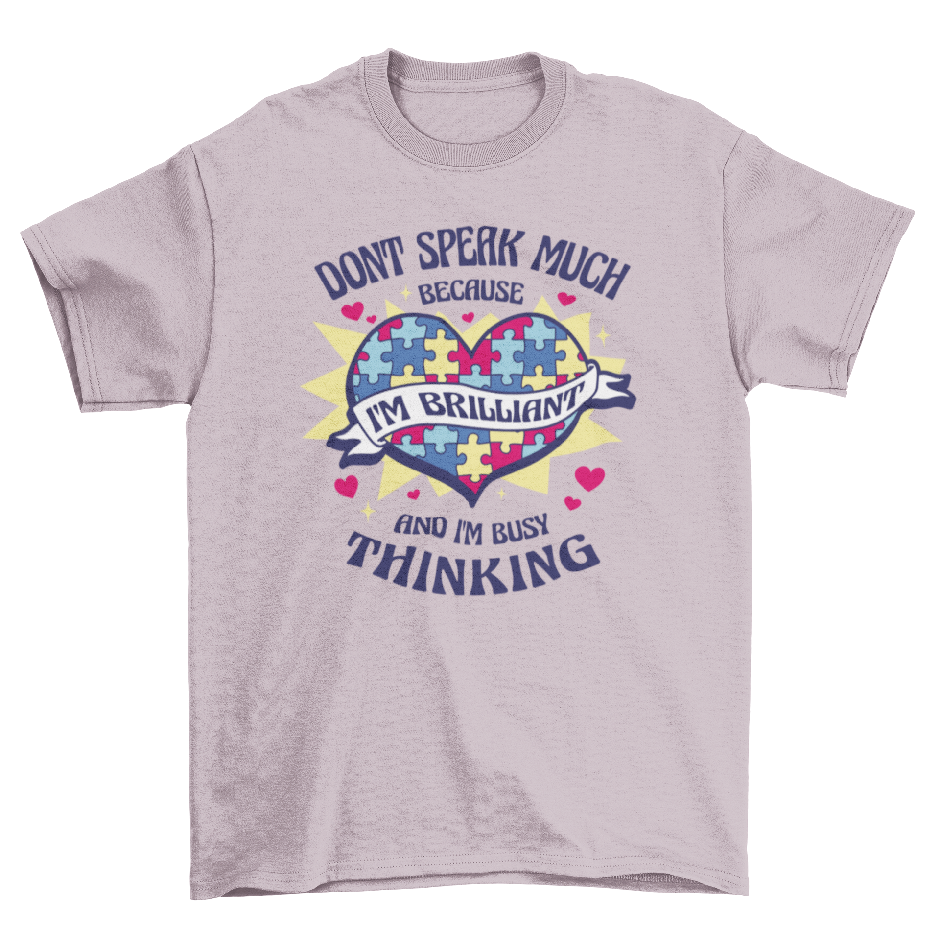 A stylish t-shirt featuring a heart made of colorful puzzle pieces with an inspiring quote about brilliance and thinking.