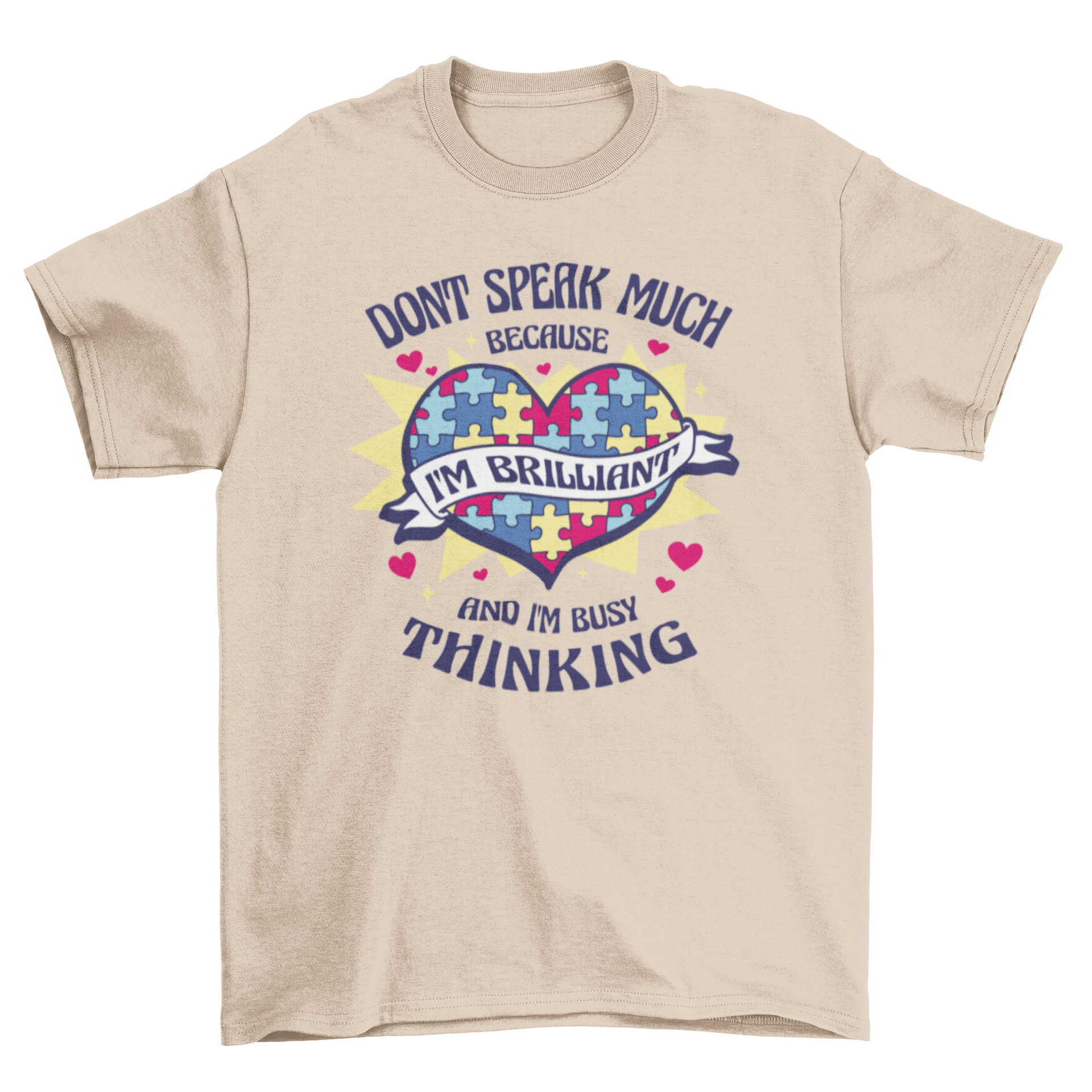 A stylish t-shirt featuring a heart made of colorful puzzle pieces with an inspiring quote about brilliance and thinking.