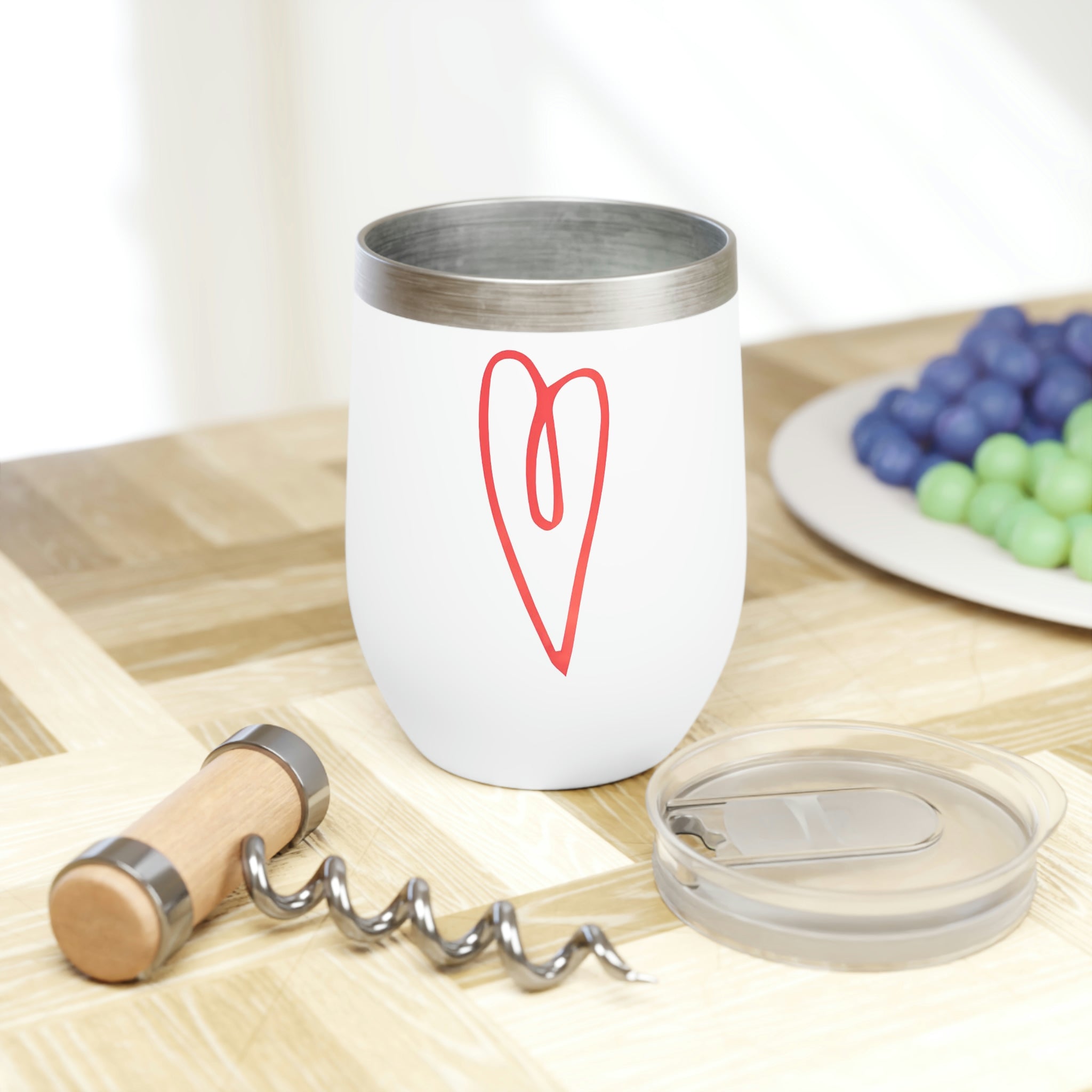 Hearts Chill Wine Tumbler in stainless steel with a customizable design, showcasing its double-insulated walls and stemless shape.