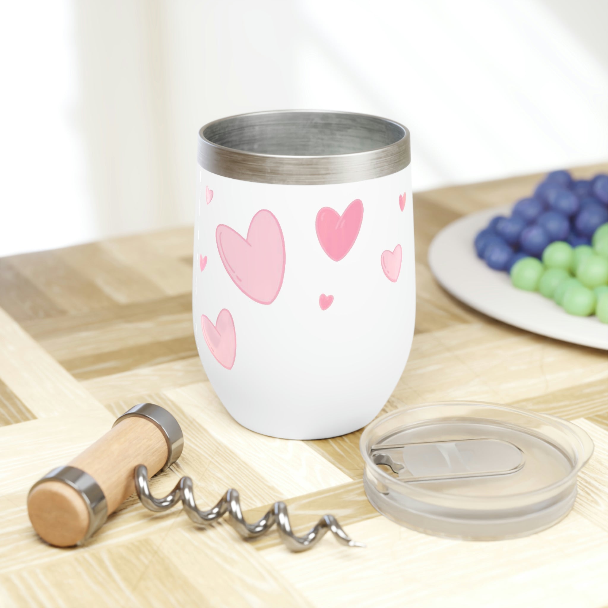 Hearts Chill Wine Tumbler in stainless steel with a customizable design, showcasing its double-insulated walls and stemless shape.