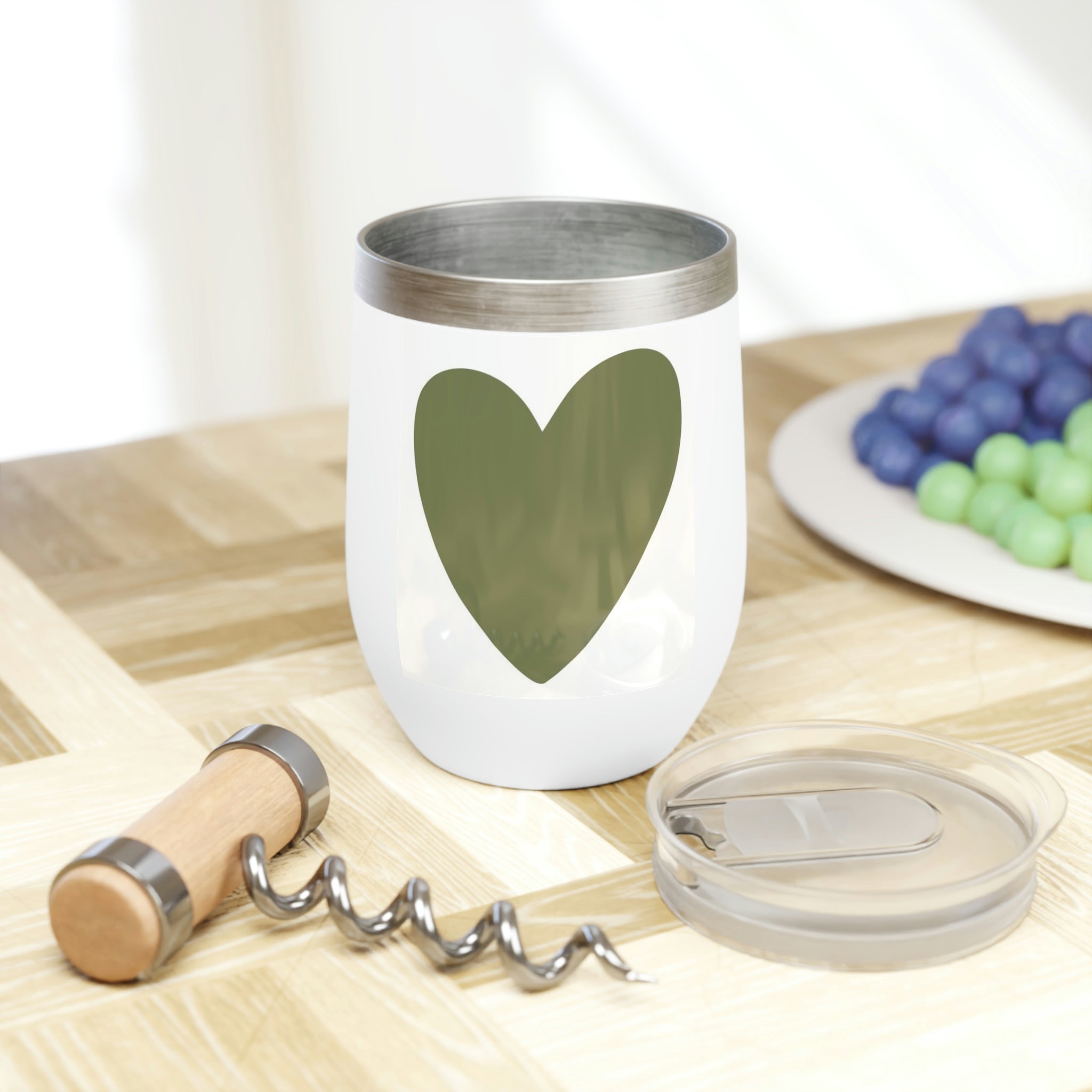 Hearts Chill Wine Tumbler in stainless steel with a customizable design, showcasing its double-insulated walls and stemless shape.