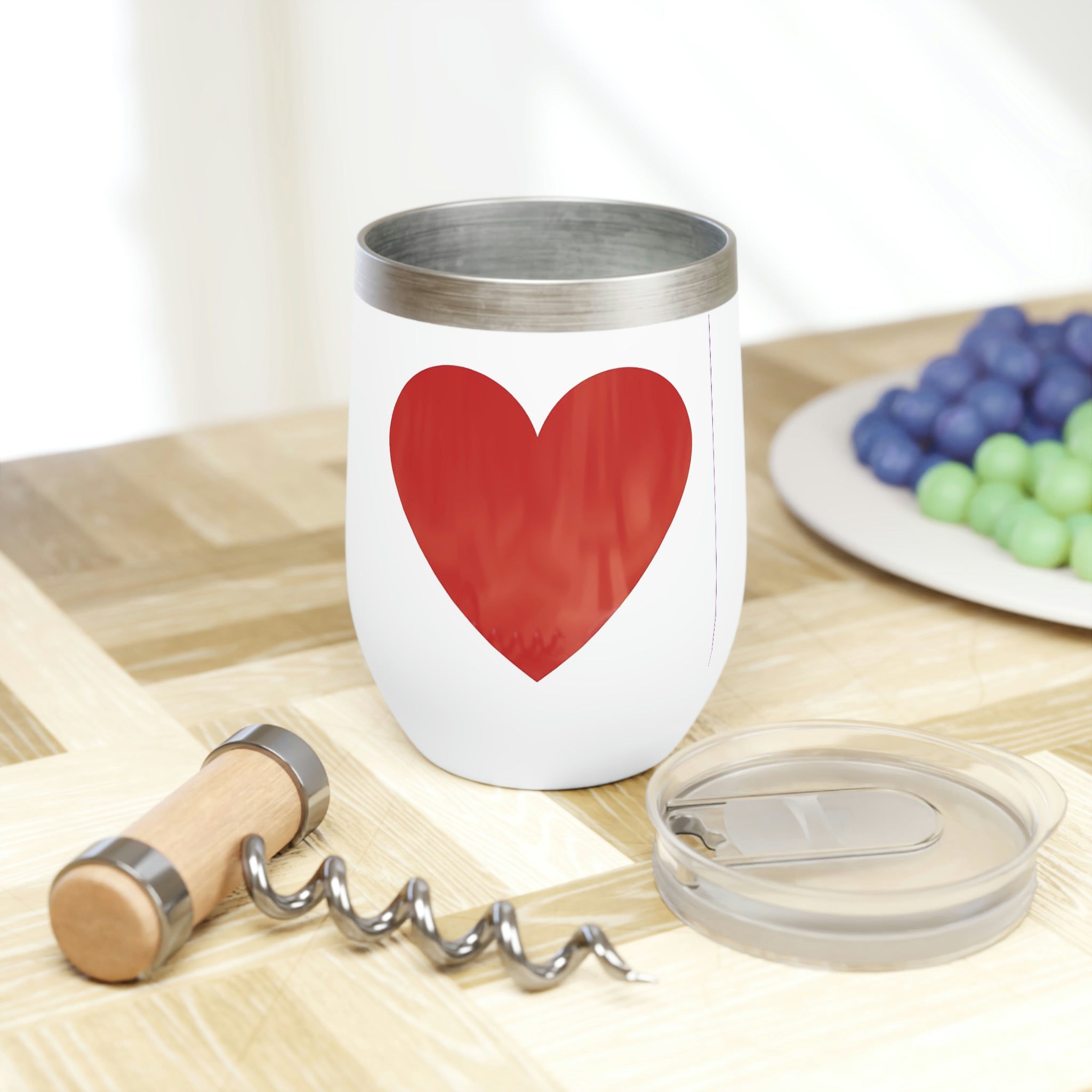 Hearts Chill Wine Tumbler in stainless steel with a customizable design, showcasing its double-insulated walls and stemless shape.