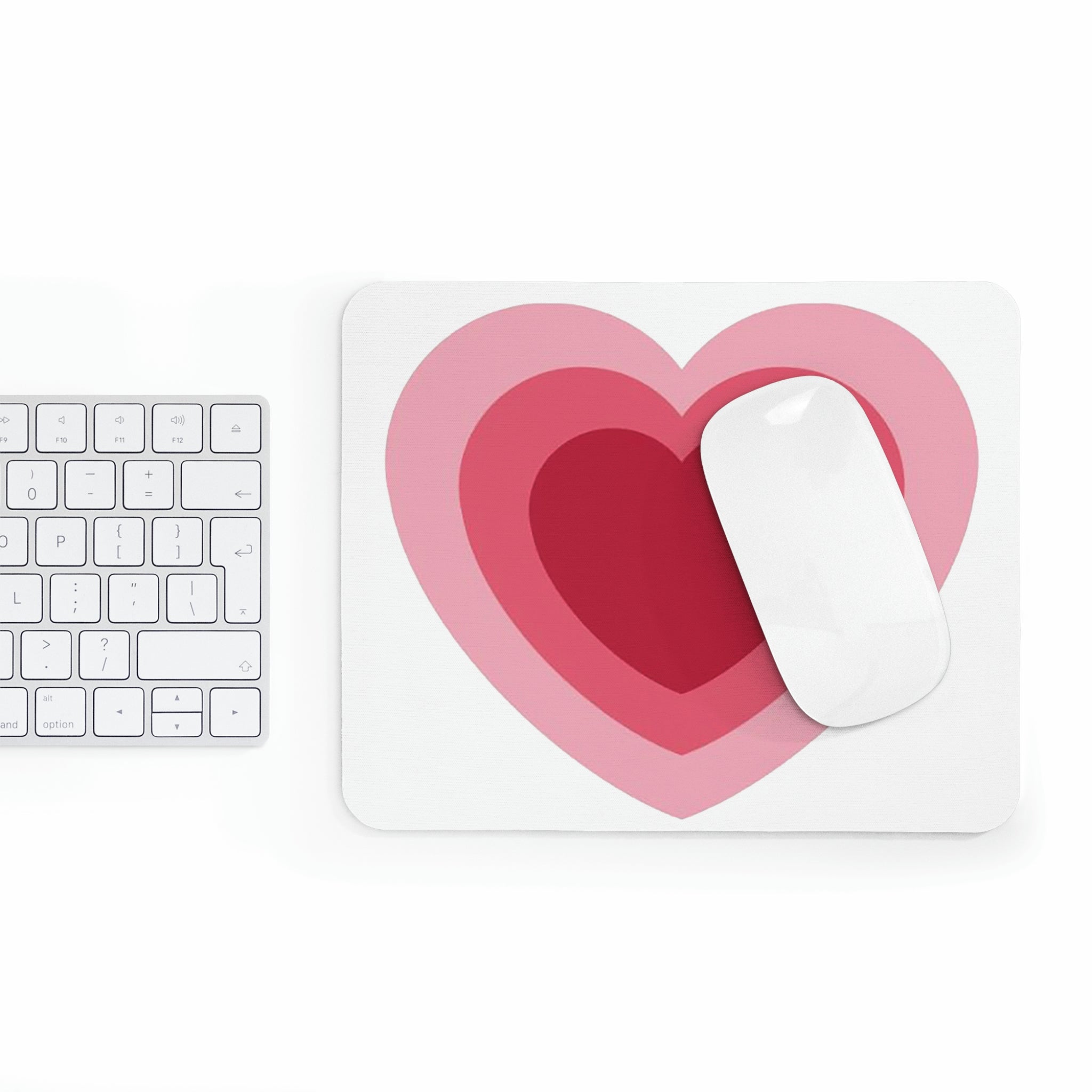 A stylish hearts design mouse pad with a non-slip rubber base, perfect for enhancing any workspace.