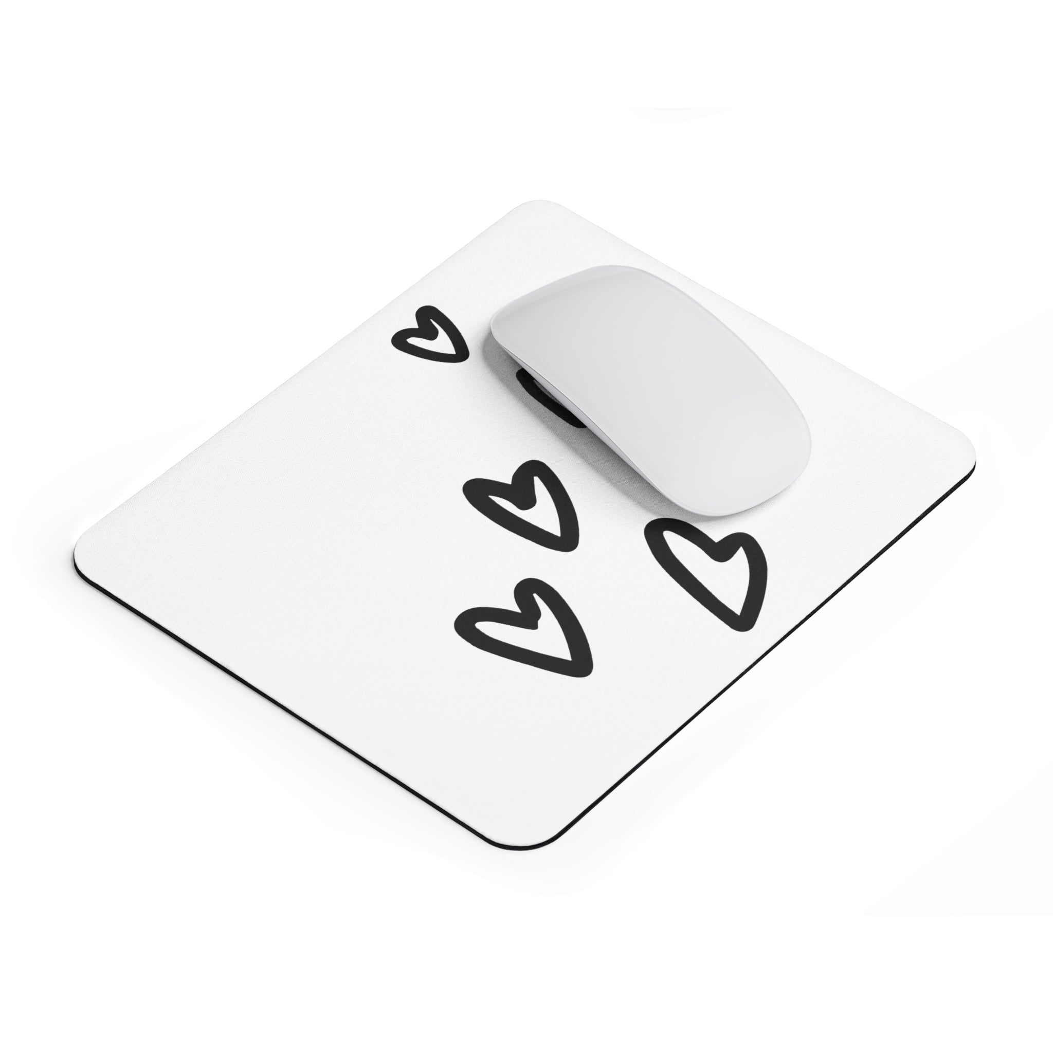 A stylish hearts-themed mouse pad designed for comfort and durability, featuring a non-slip base.