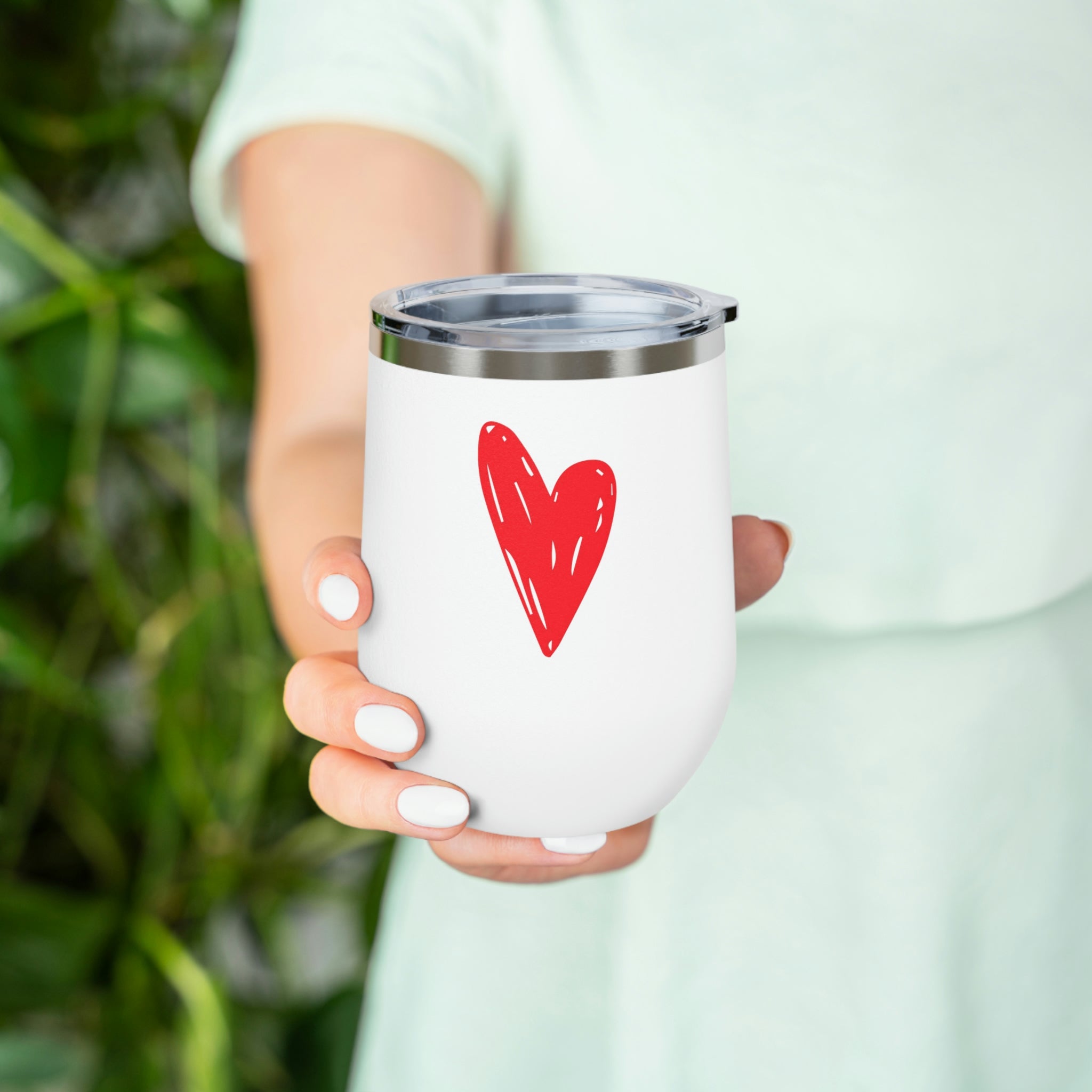 Hearts Wine Tumbler in stainless steel with a clear plastic lid, showcasing a stylish design perfect for hot and cold beverages.