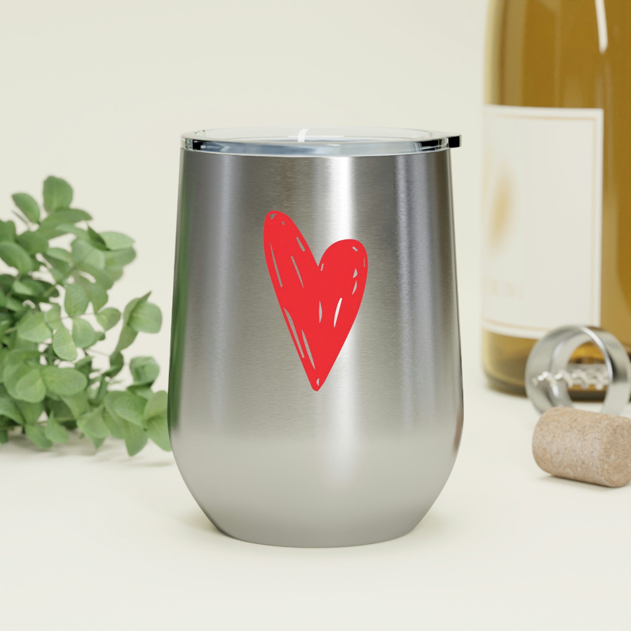 Hearts Wine Tumbler in stainless steel with a clear plastic lid, showcasing a stylish design perfect for hot and cold beverages.