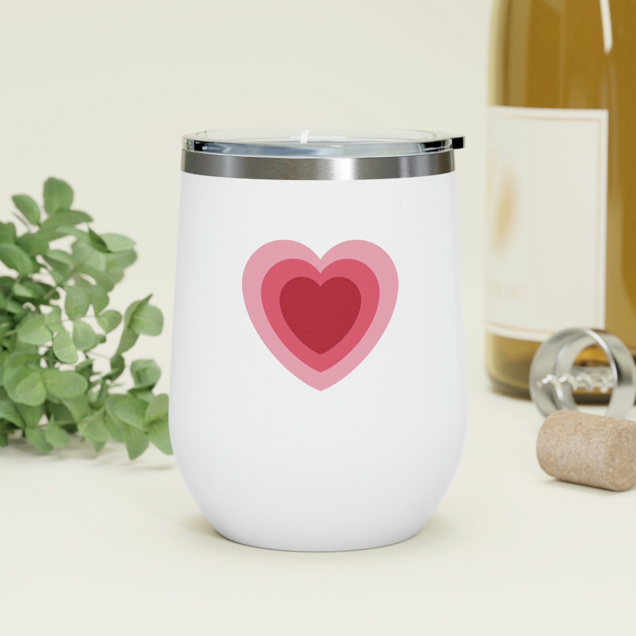 Hearts Wine Tumbler in stainless steel with a clear plastic lid, showcasing a stylish design perfect for hot and cold beverages.