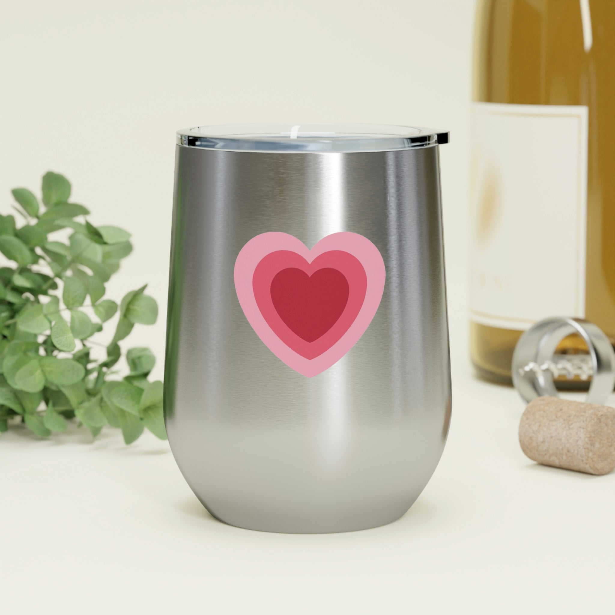 Hearts Wine Tumbler in stainless steel with a clear plastic lid, showcasing a stylish design perfect for hot and cold beverages.