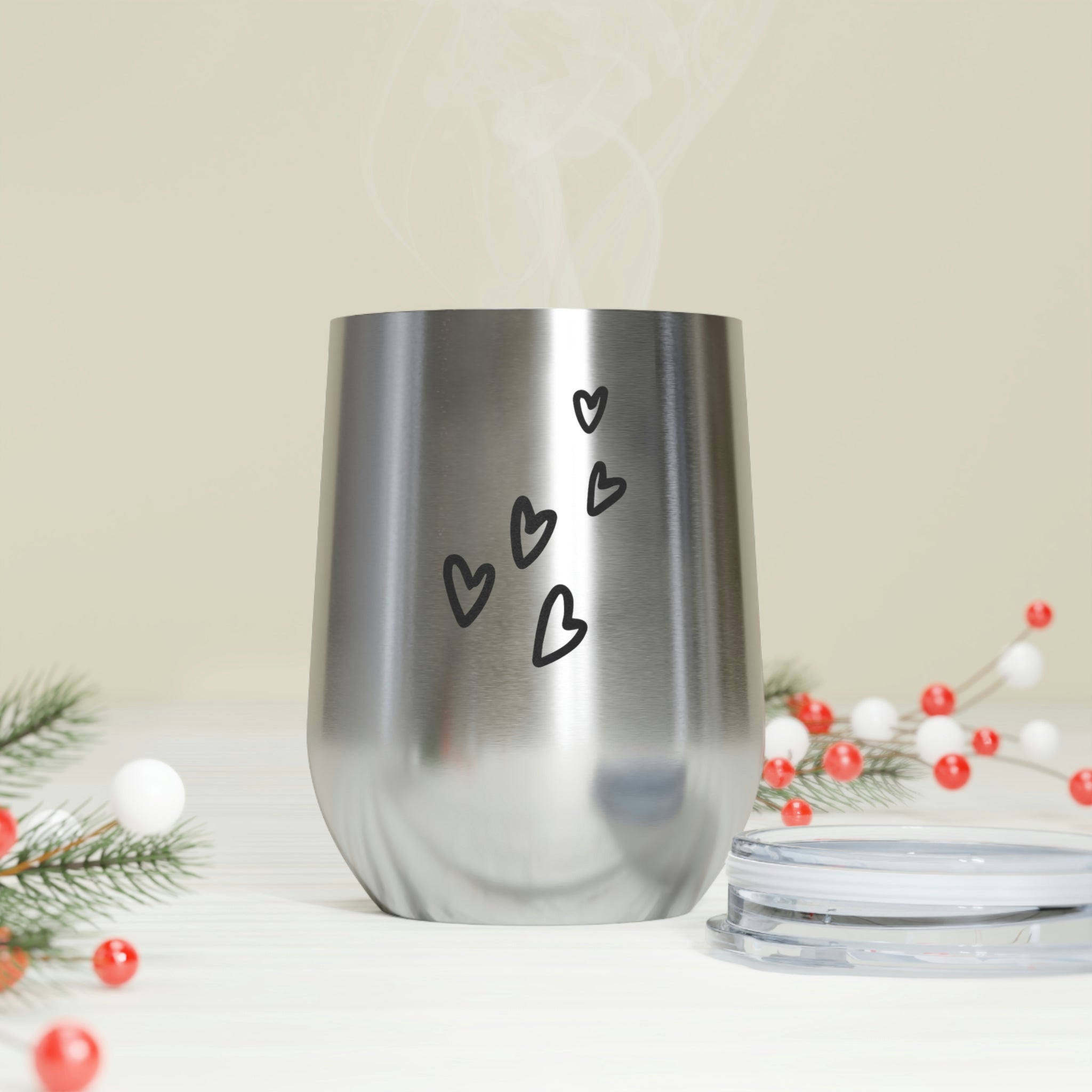 Hearts Wine Tumbler in stainless steel with a clear plastic lid, showcasing a stylish design perfect for hot and cold beverages.