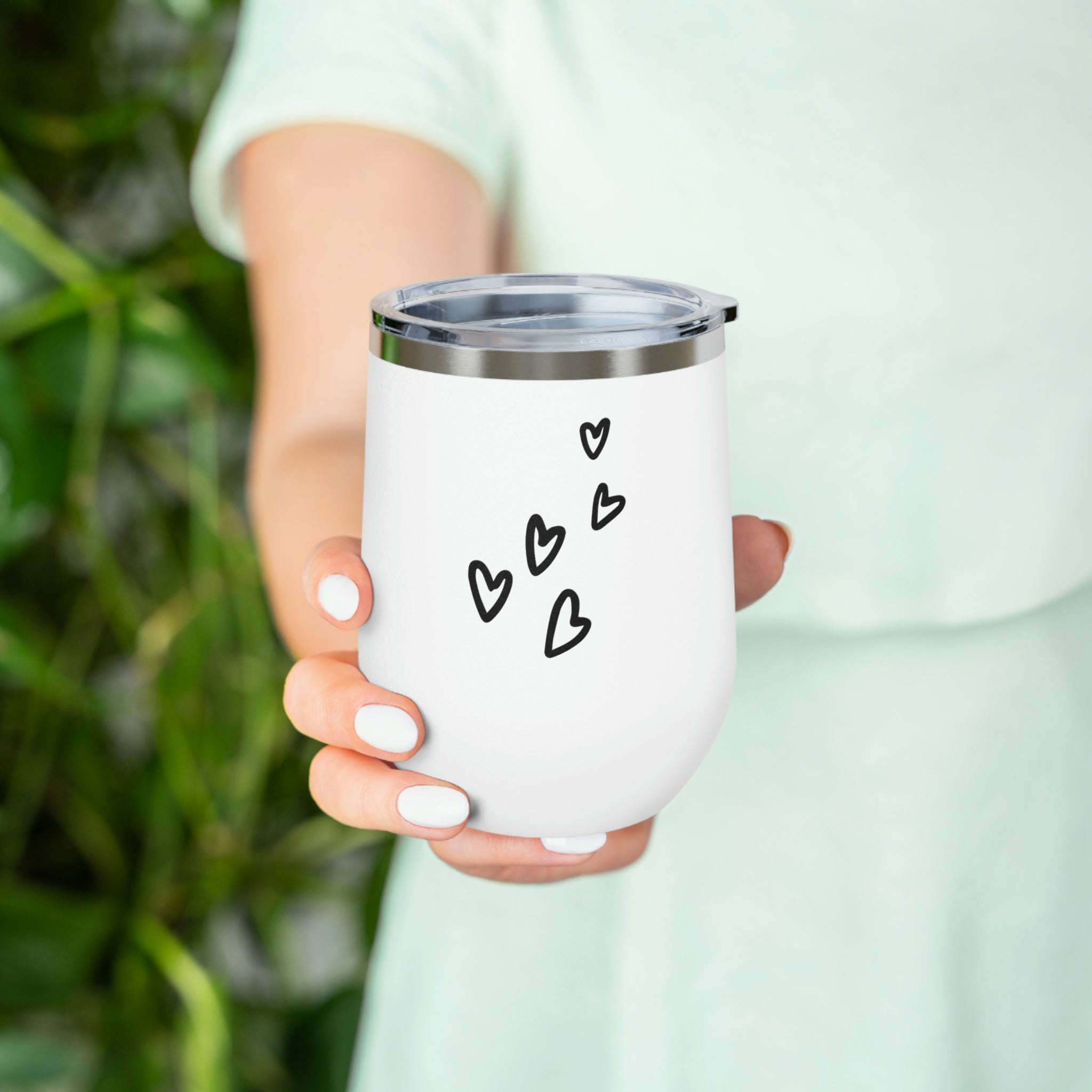 Hearts Wine Tumbler in stainless steel with a clear plastic lid, showcasing a stylish design perfect for hot and cold beverages.