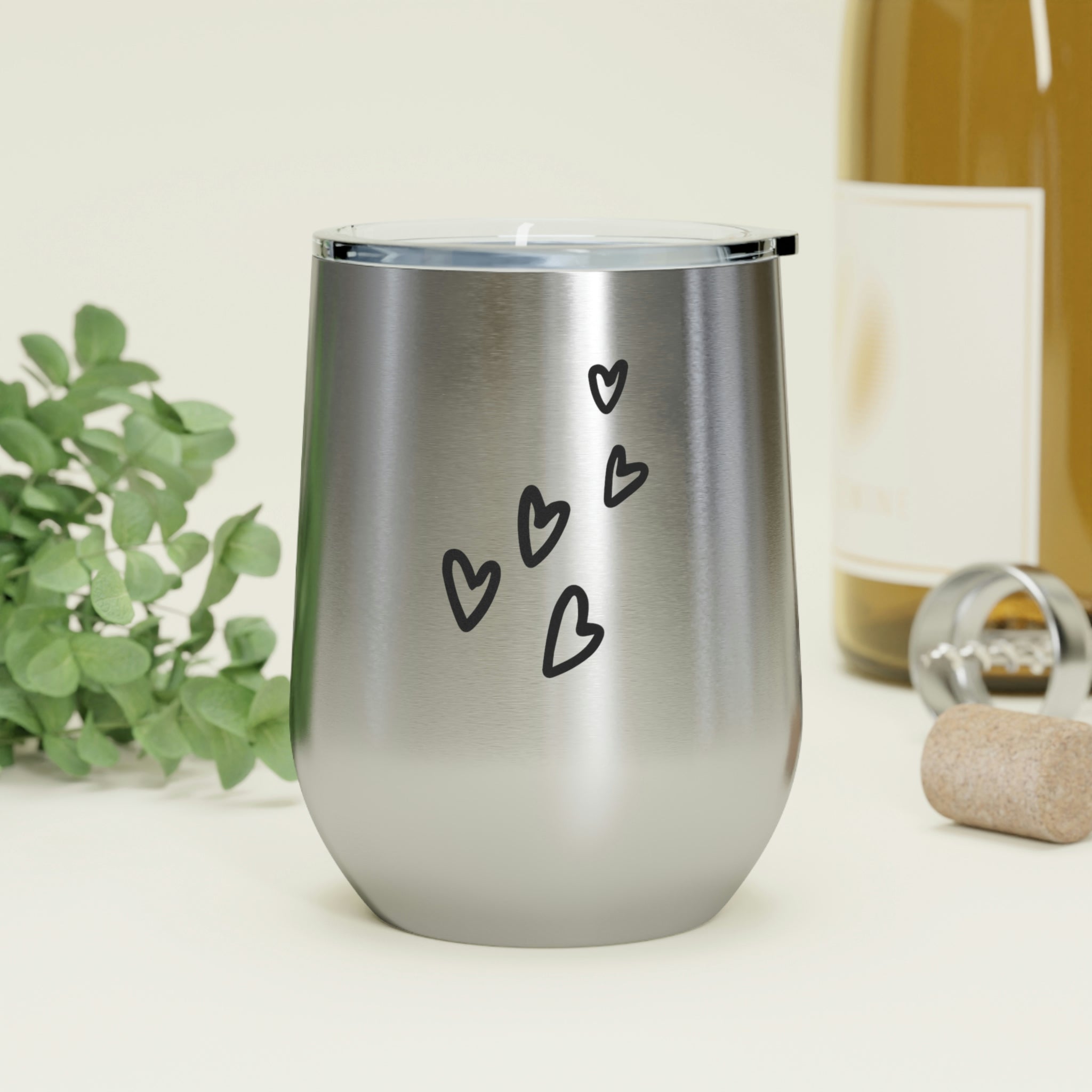 Hearts Wine Tumbler in stainless steel with a clear plastic lid, showcasing a stylish design perfect for hot and cold beverages.