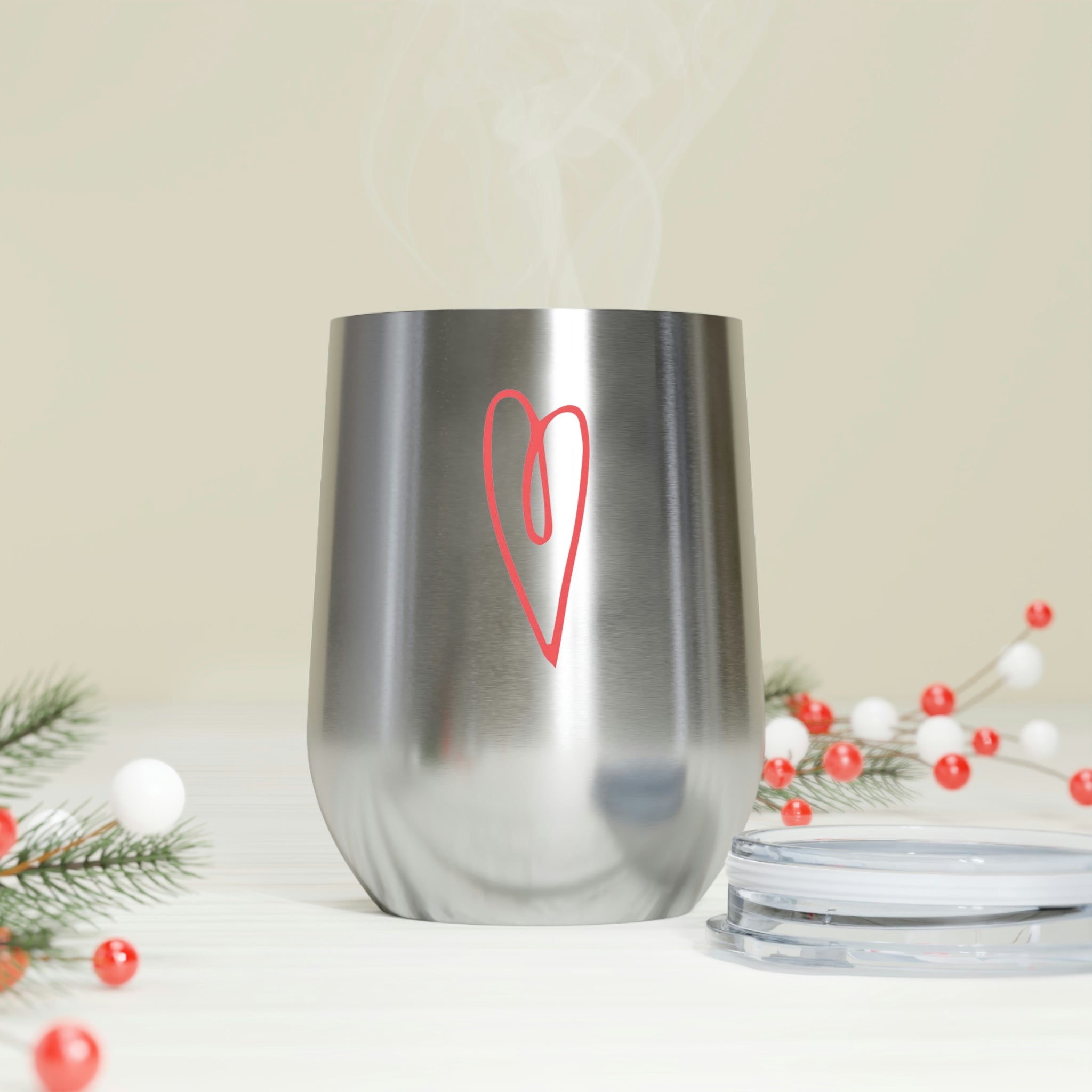 Hearts Wine Tumbler in stainless steel with a clear plastic lid, showcasing a stylish design for hot and cold beverages.