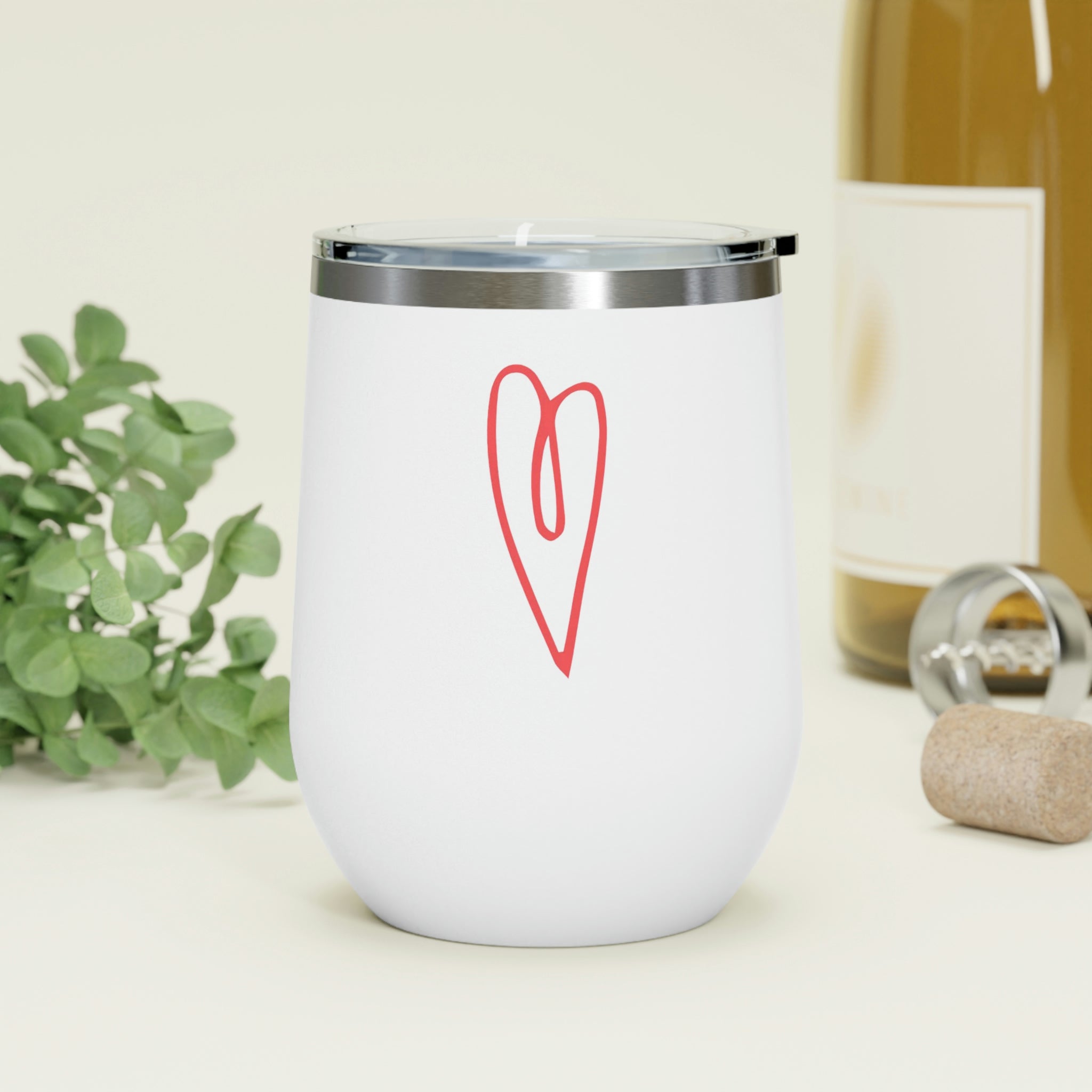 Hearts Wine Tumbler in stainless steel with a clear plastic lid, showcasing a stylish design for hot and cold beverages.