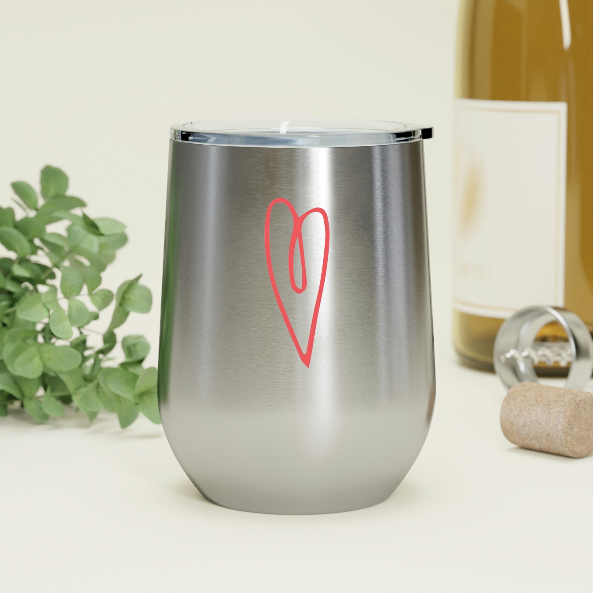 Hearts Wine Tumbler in stainless steel with a clear plastic lid, showcasing a stylish design for hot and cold beverages.